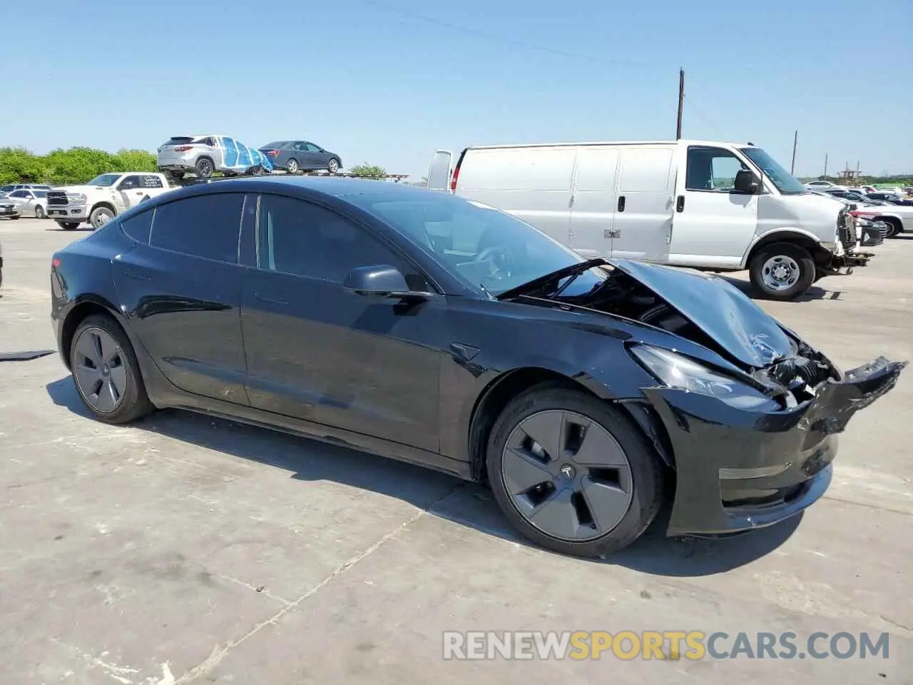 4 Photograph of a damaged car 5YJ3E1EA1NF315906 TESLA MODEL 3 2022