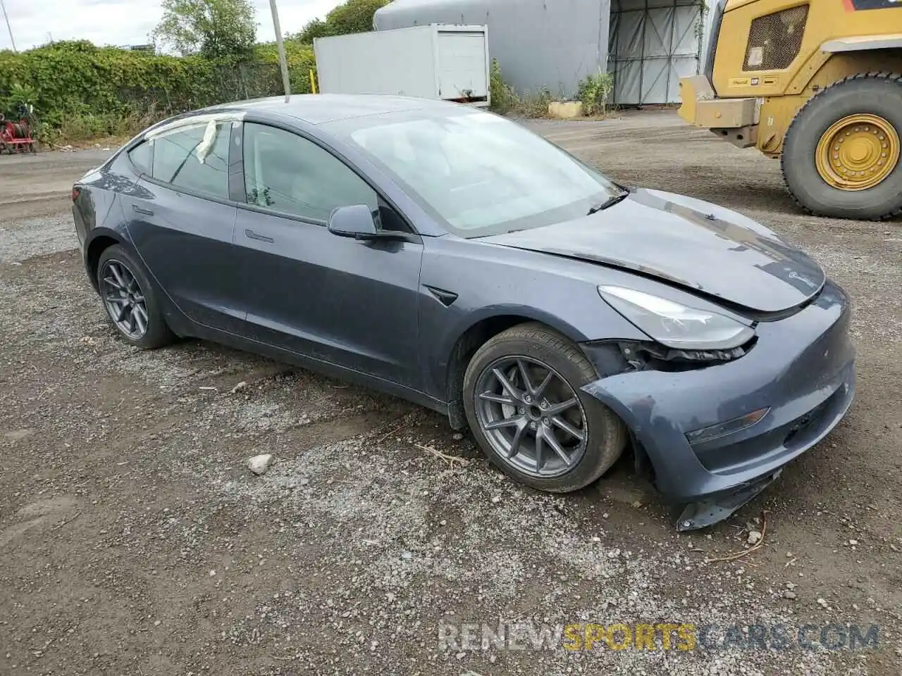 4 Photograph of a damaged car 5YJ3E1EA1NF348727 TESLA MODEL 3 2022