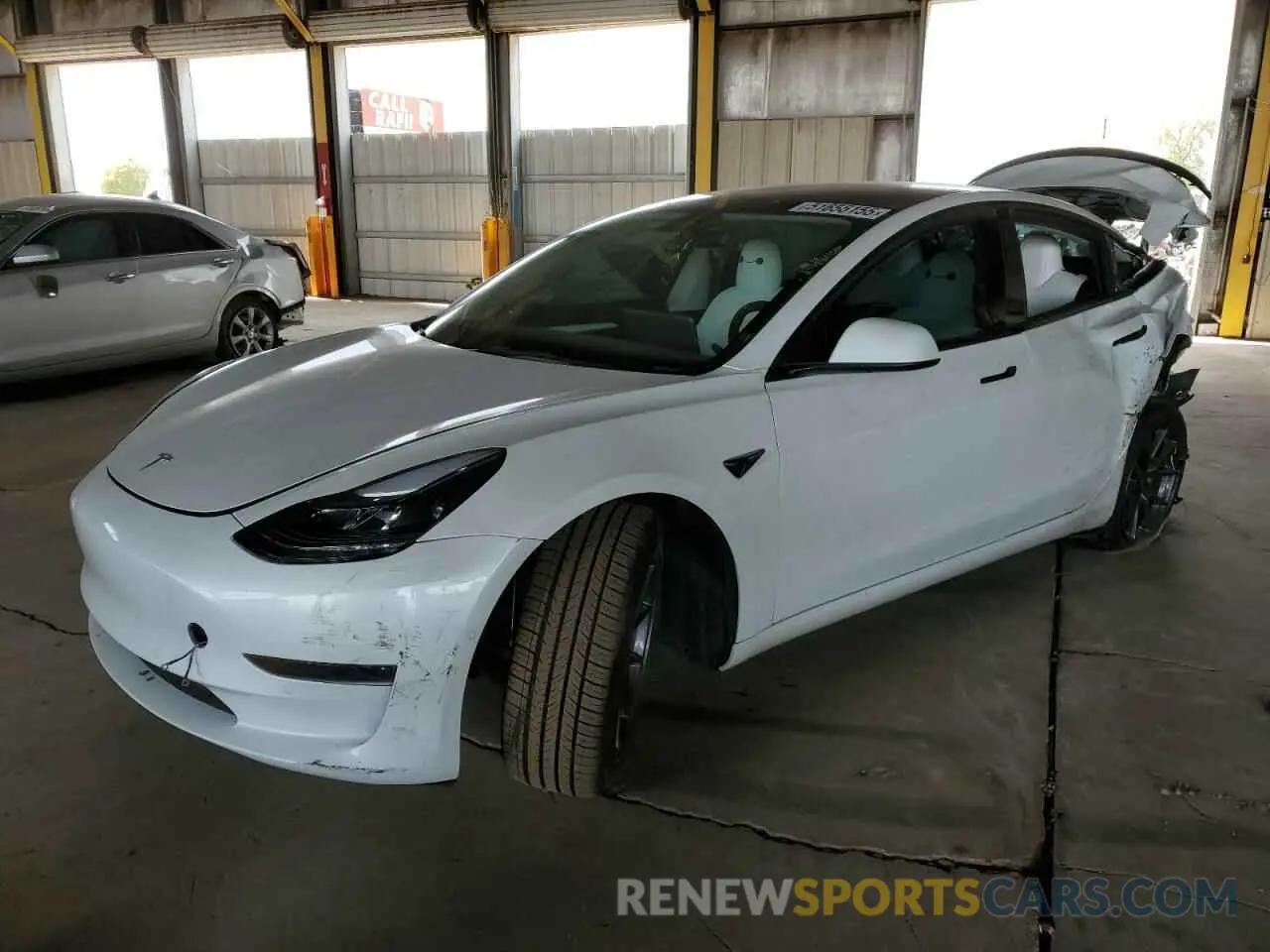 1 Photograph of a damaged car 5YJ3E1EA1NF358612 TESLA MODEL 3 2022