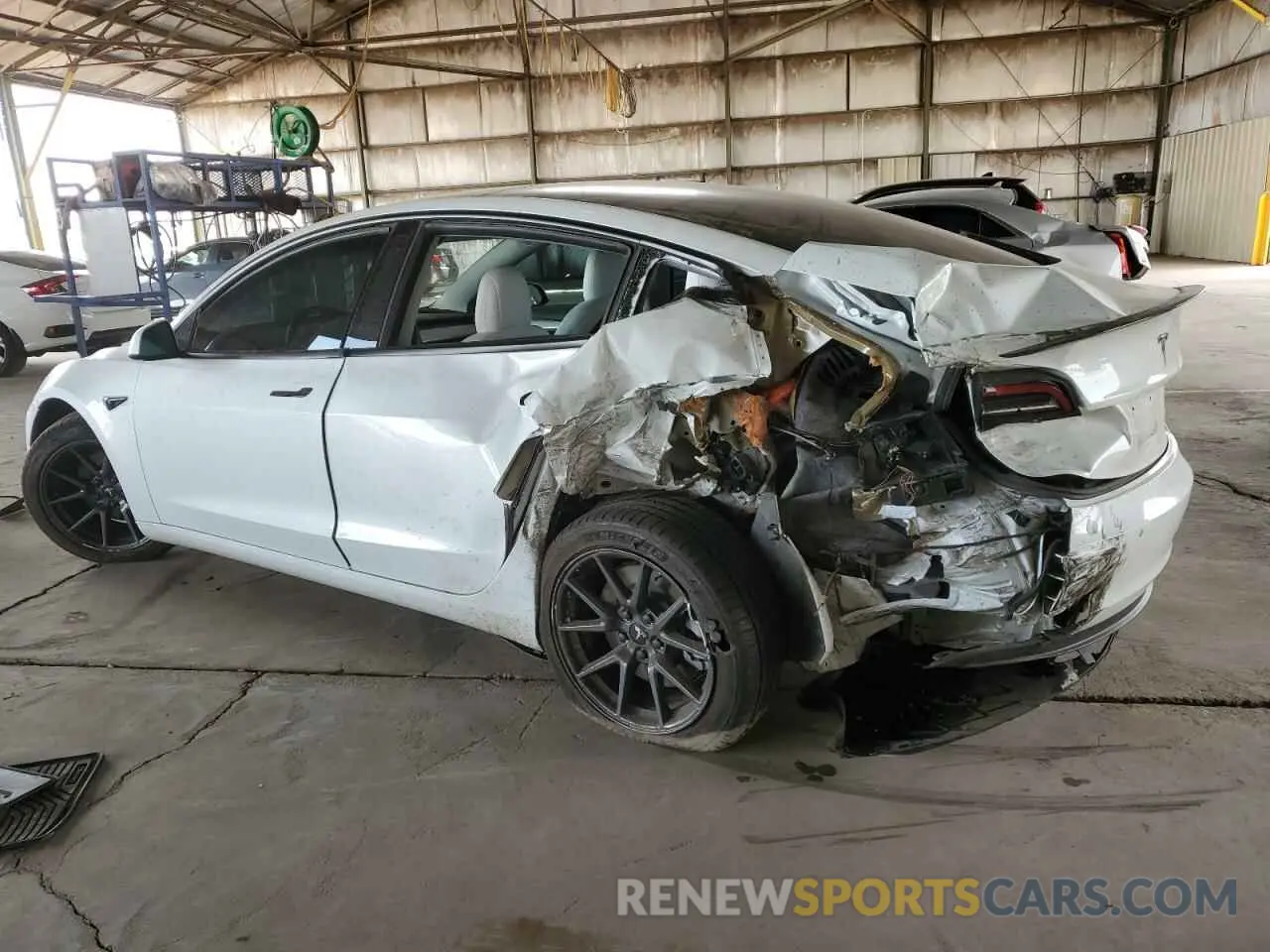2 Photograph of a damaged car 5YJ3E1EA1NF358612 TESLA MODEL 3 2022