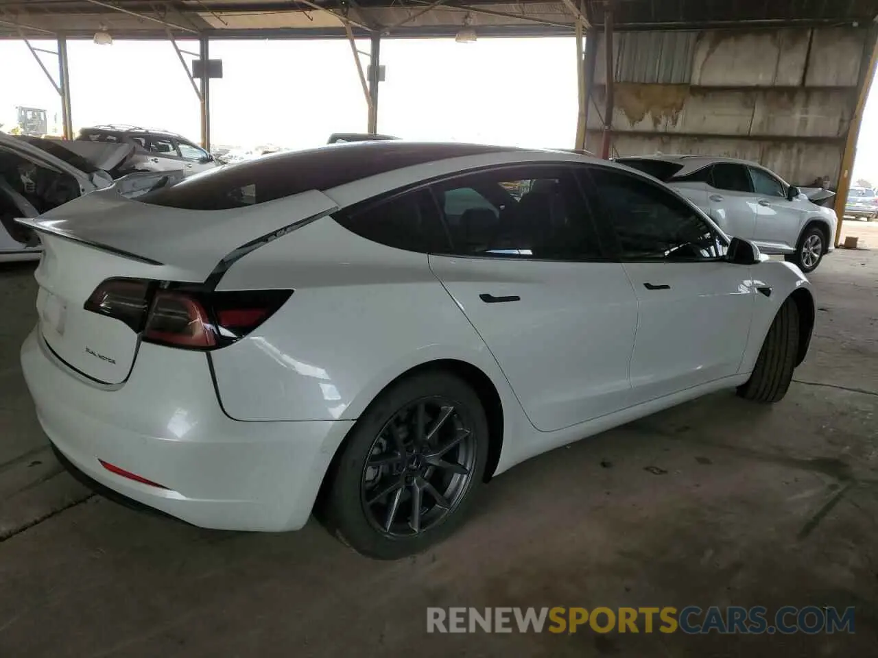3 Photograph of a damaged car 5YJ3E1EA1NF358612 TESLA MODEL 3 2022