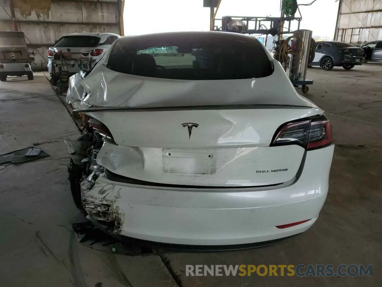 6 Photograph of a damaged car 5YJ3E1EA1NF358612 TESLA MODEL 3 2022