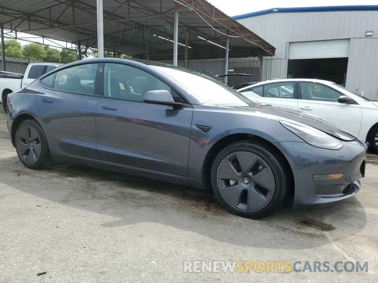 4 Photograph of a damaged car 5YJ3E1EA1NF368573 TESLA MODEL 3 2022