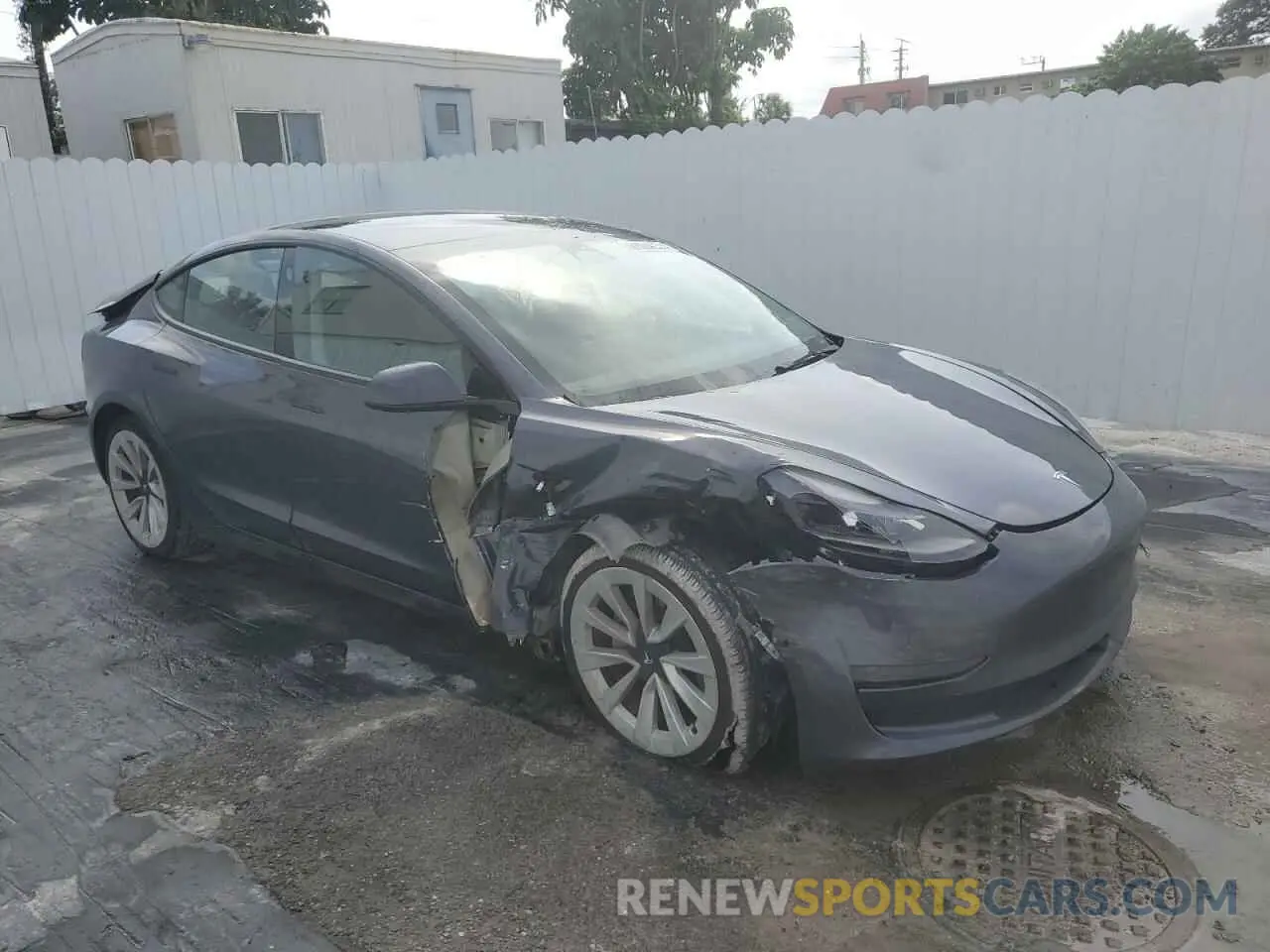 4 Photograph of a damaged car 5YJ3E1EA1NF369688 TESLA MODEL 3 2022