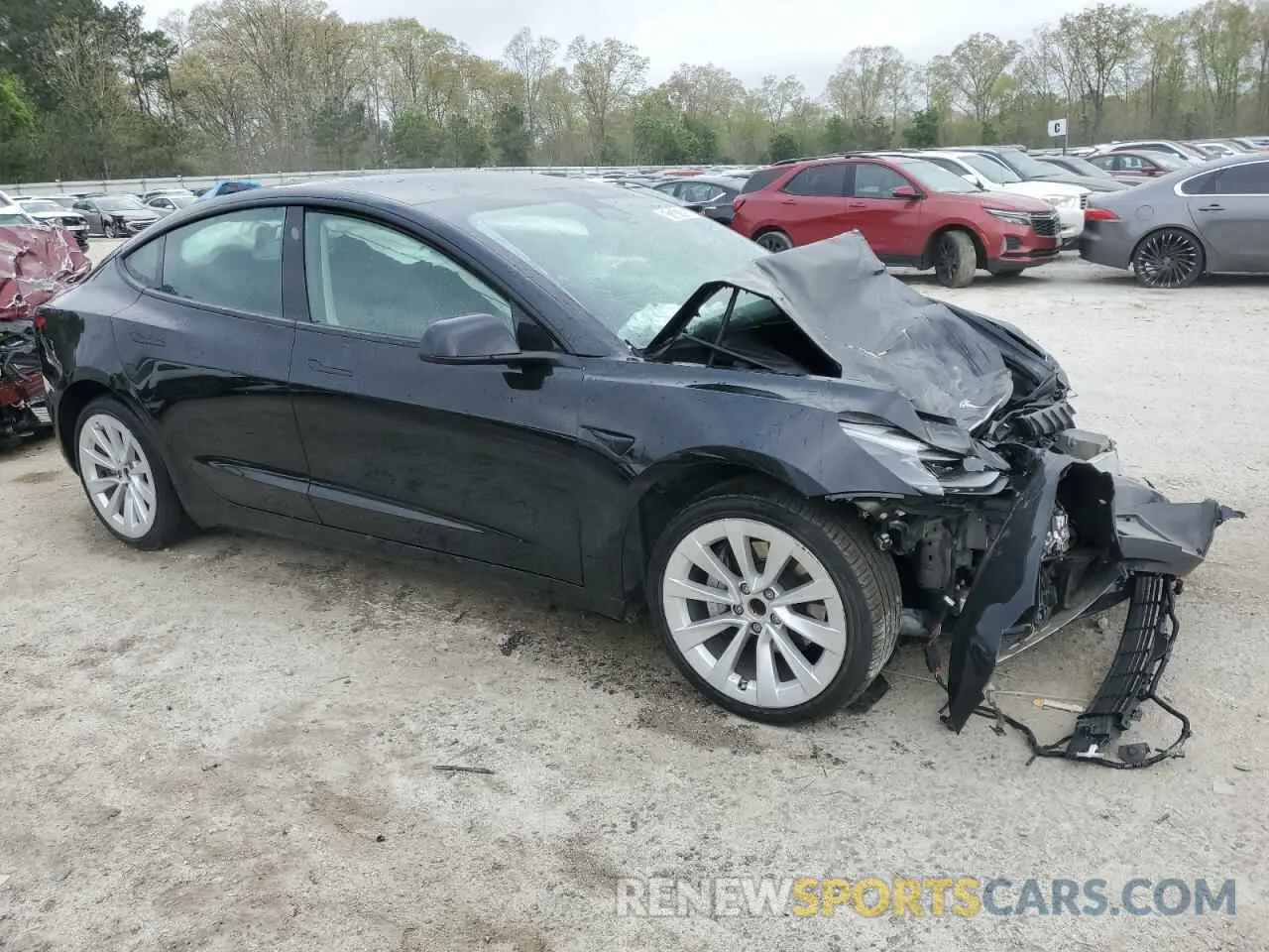 4 Photograph of a damaged car 5YJ3E1EA1NF369979 TESLA MODEL 3 2022