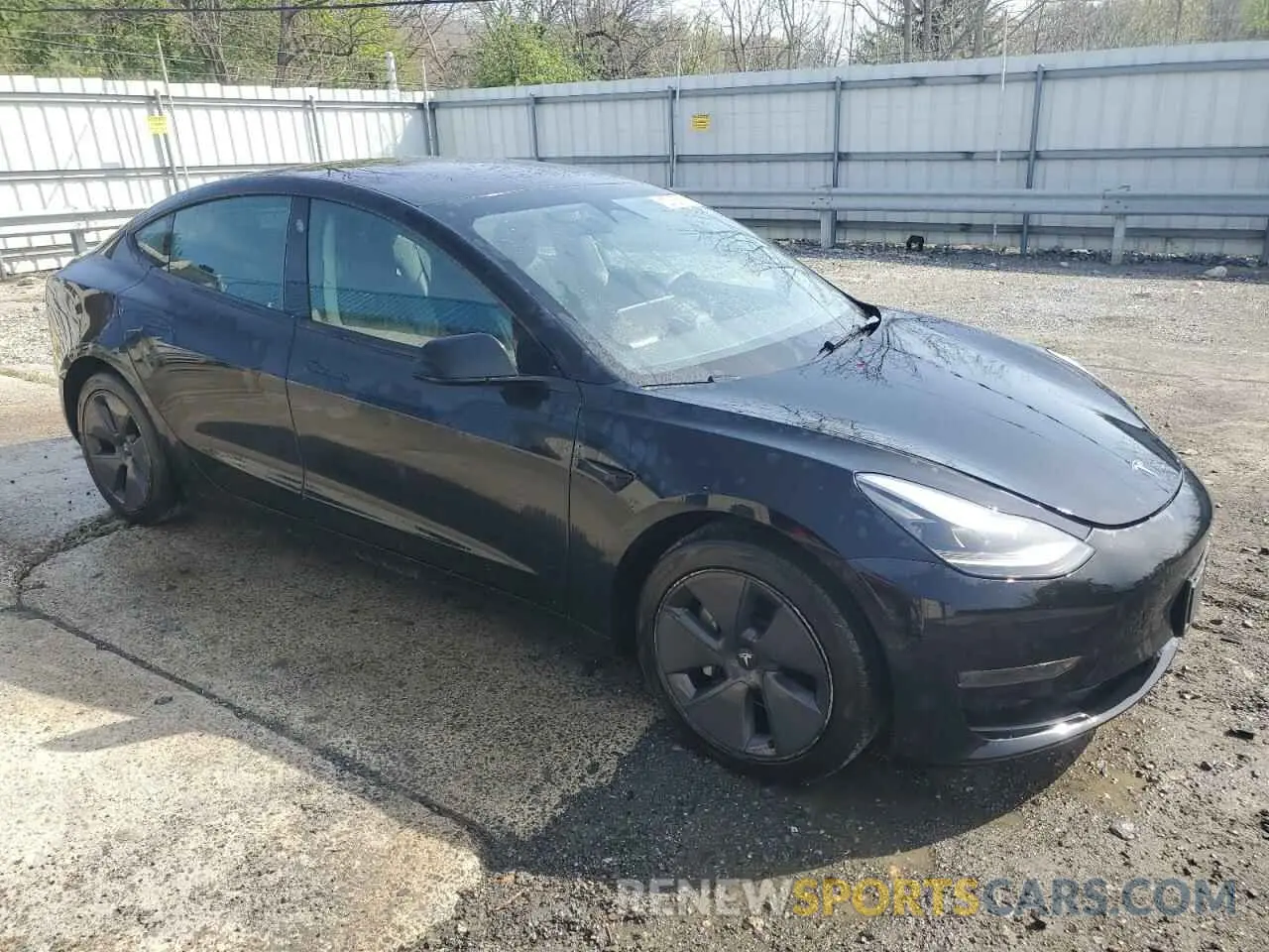 4 Photograph of a damaged car 5YJ3E1EA1NF370209 TESLA MODEL 3 2022