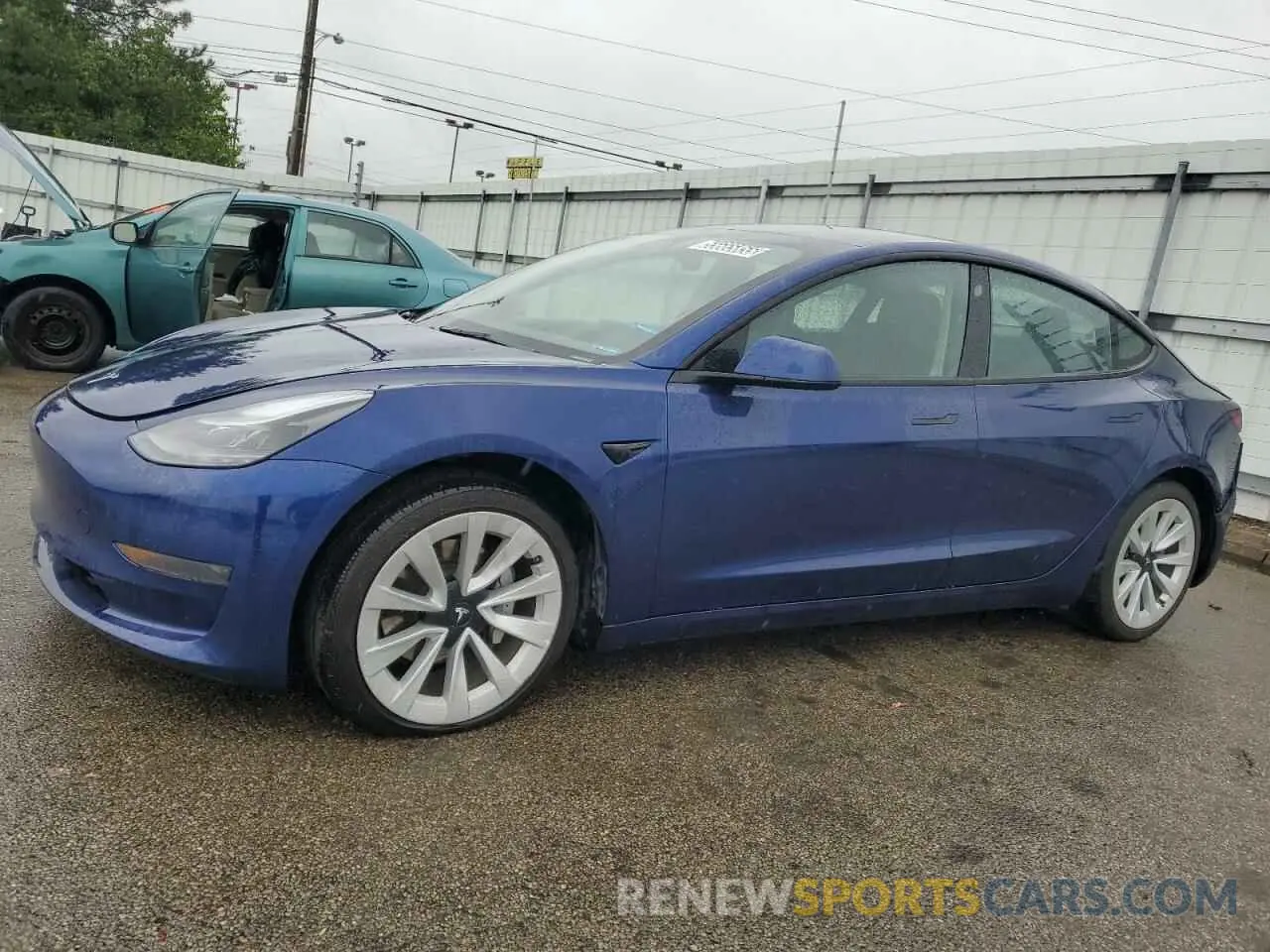 1 Photograph of a damaged car 5YJ3E1EA1NF371585 TESLA MODEL 3 2022