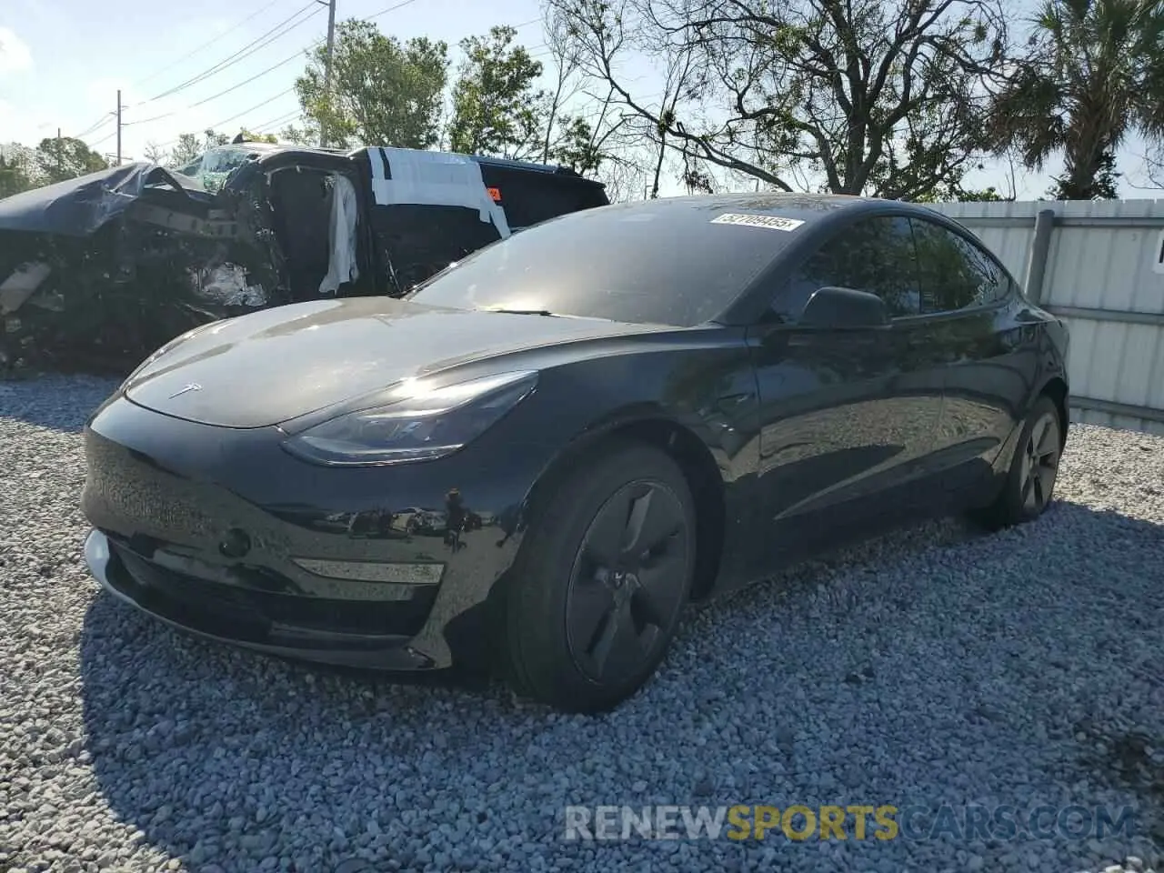 1 Photograph of a damaged car 5YJ3E1EA1NF374390 TESLA MODEL 3 2022