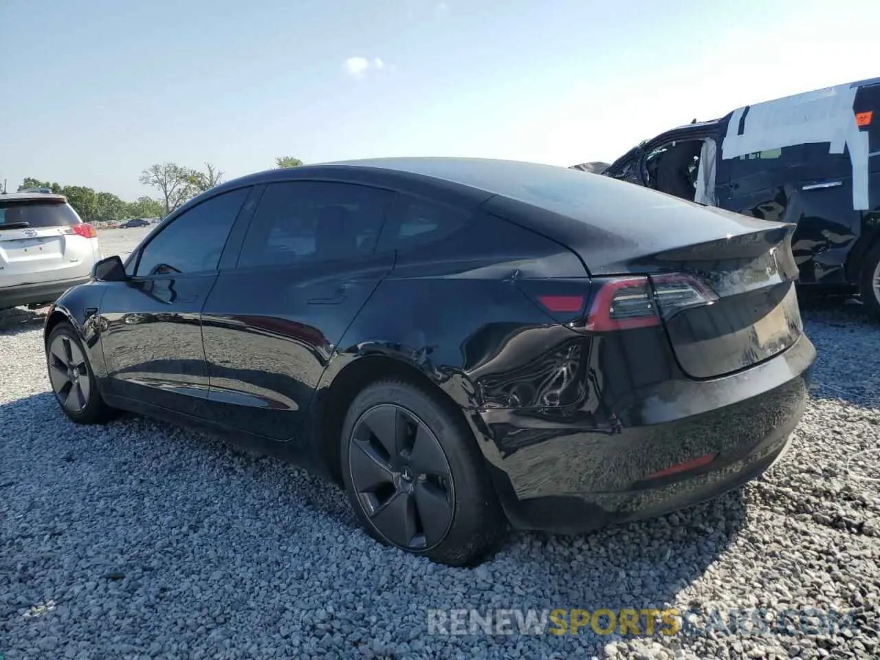 2 Photograph of a damaged car 5YJ3E1EA1NF374390 TESLA MODEL 3 2022