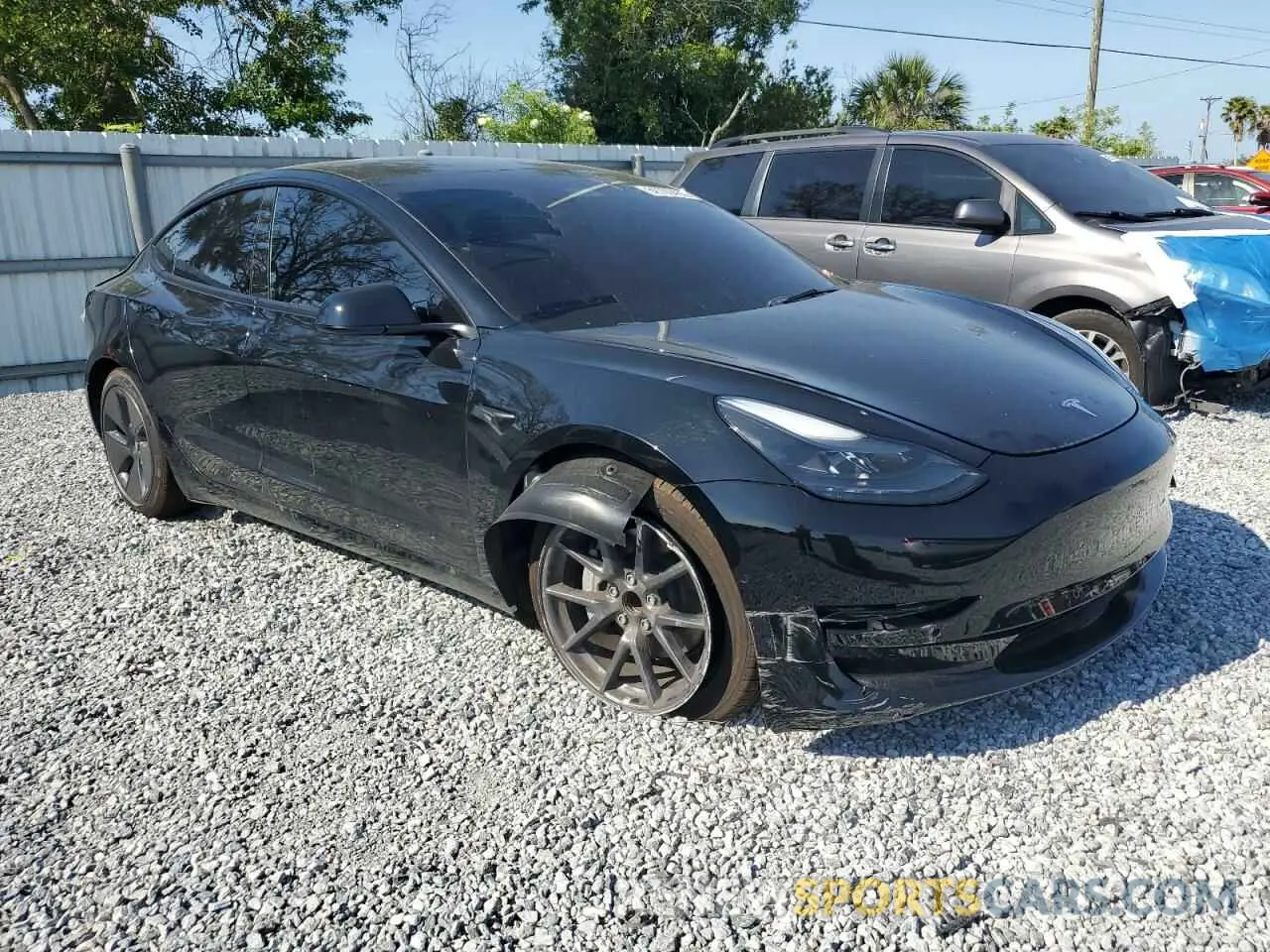 4 Photograph of a damaged car 5YJ3E1EA1NF374390 TESLA MODEL 3 2022