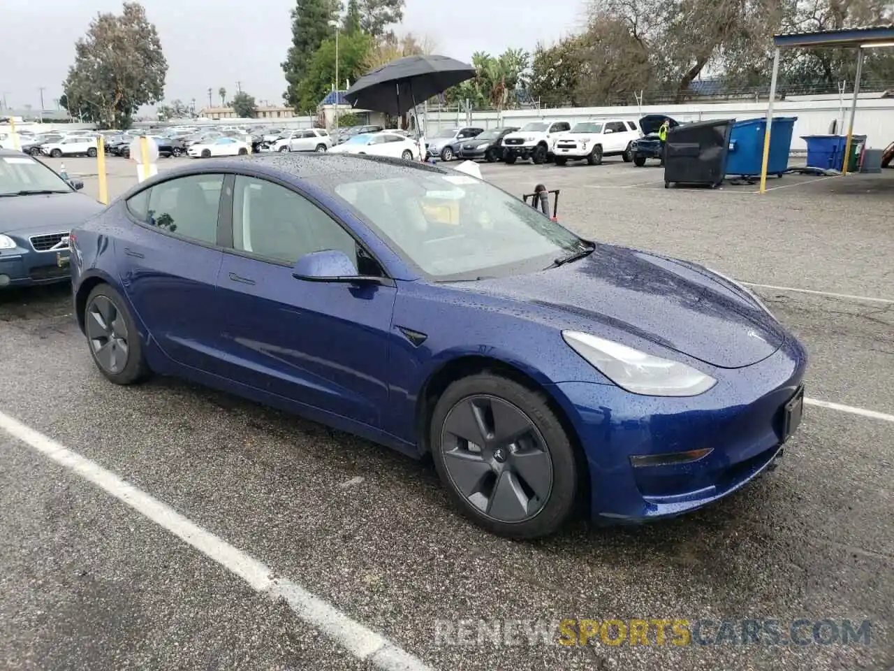 4 Photograph of a damaged car 5YJ3E1EA1NF375507 TESLA MODEL 3 2022