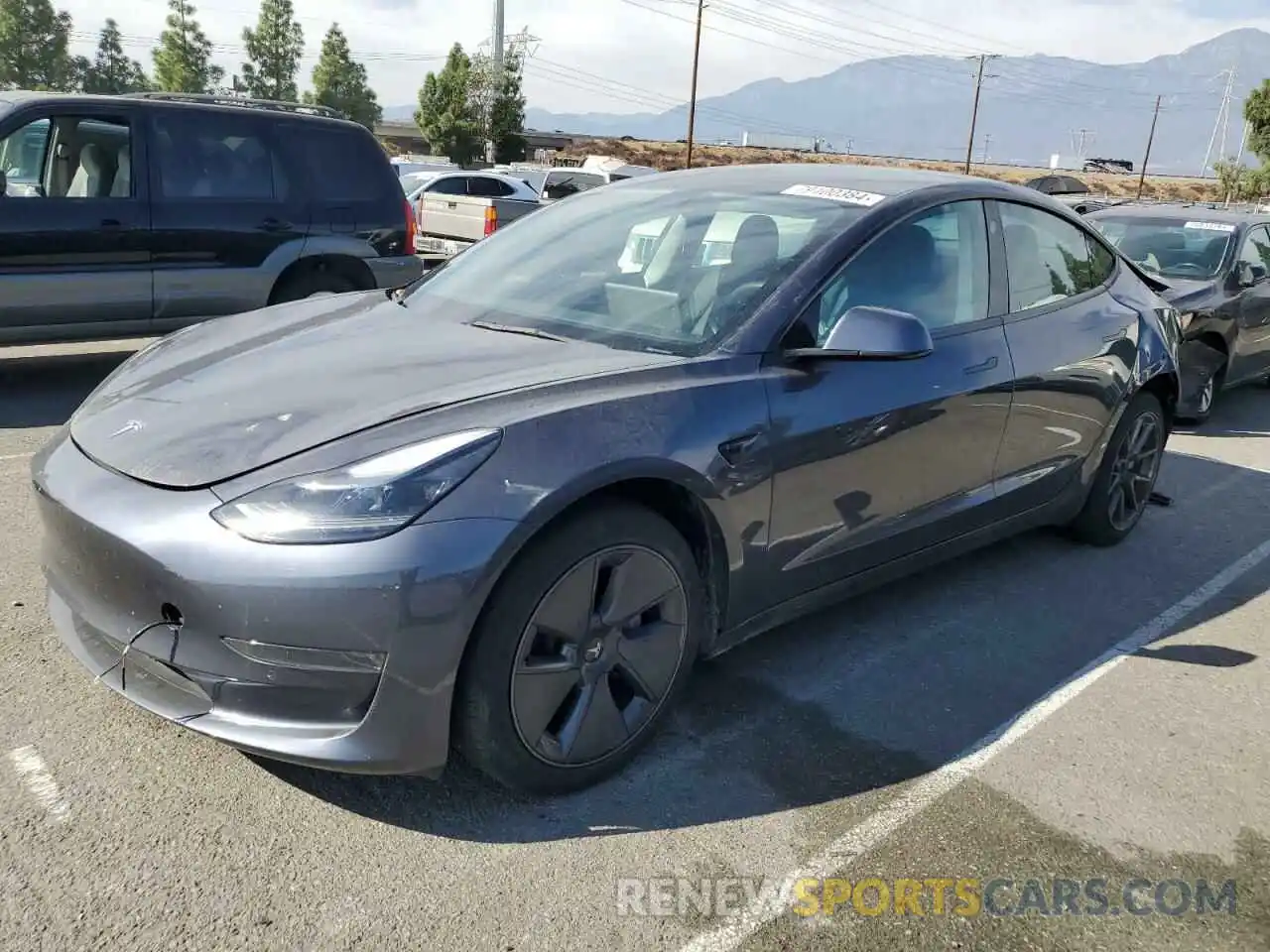 1 Photograph of a damaged car 5YJ3E1EA2NF114936 TESLA MODEL 3 2022