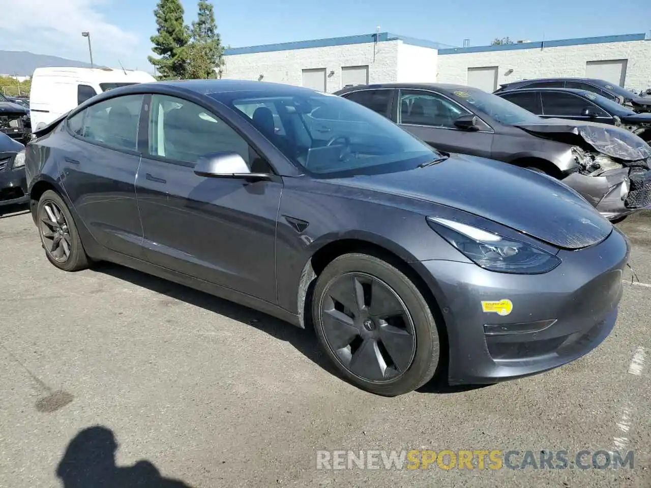 4 Photograph of a damaged car 5YJ3E1EA2NF114936 TESLA MODEL 3 2022