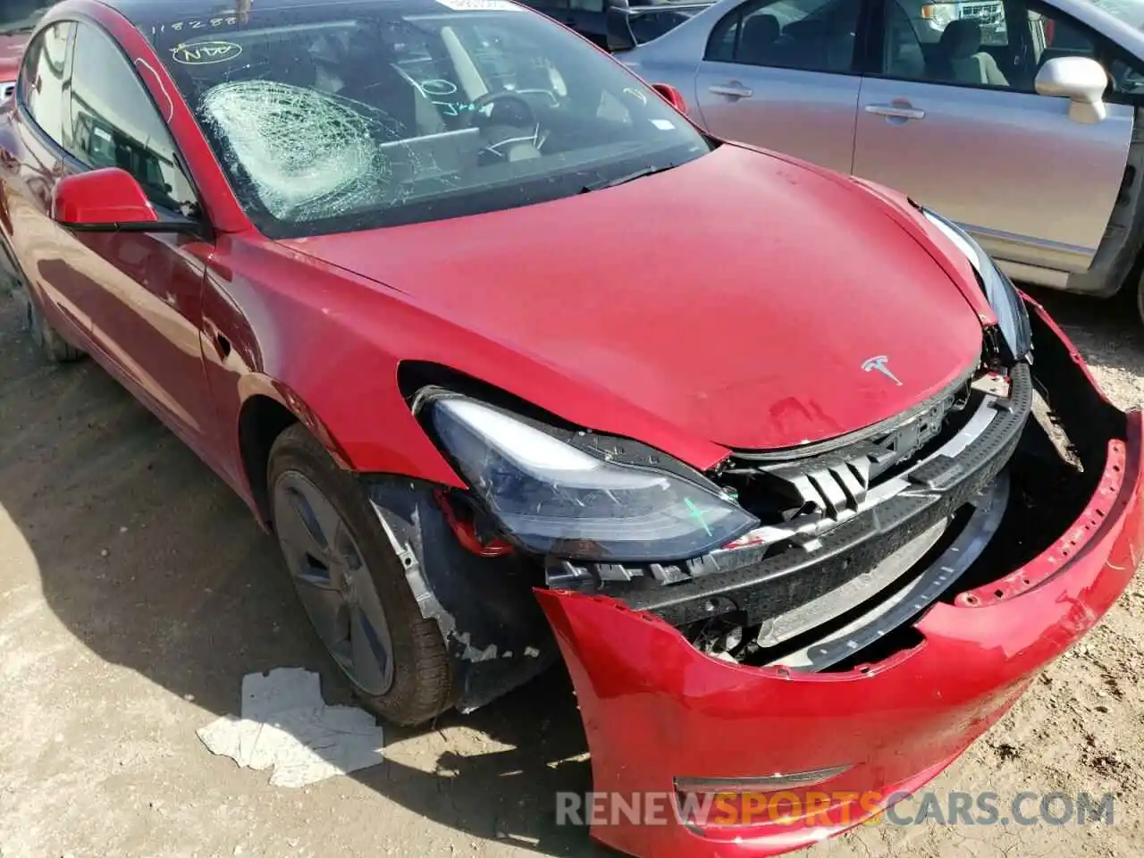 9 Photograph of a damaged car 5YJ3E1EA2NF118288 TESLA MODEL 3 2022