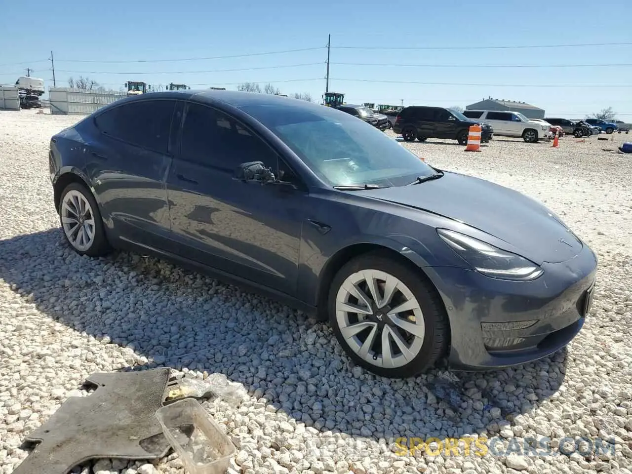4 Photograph of a damaged car 5YJ3E1EA2NF188955 TESLA MODEL 3 2022