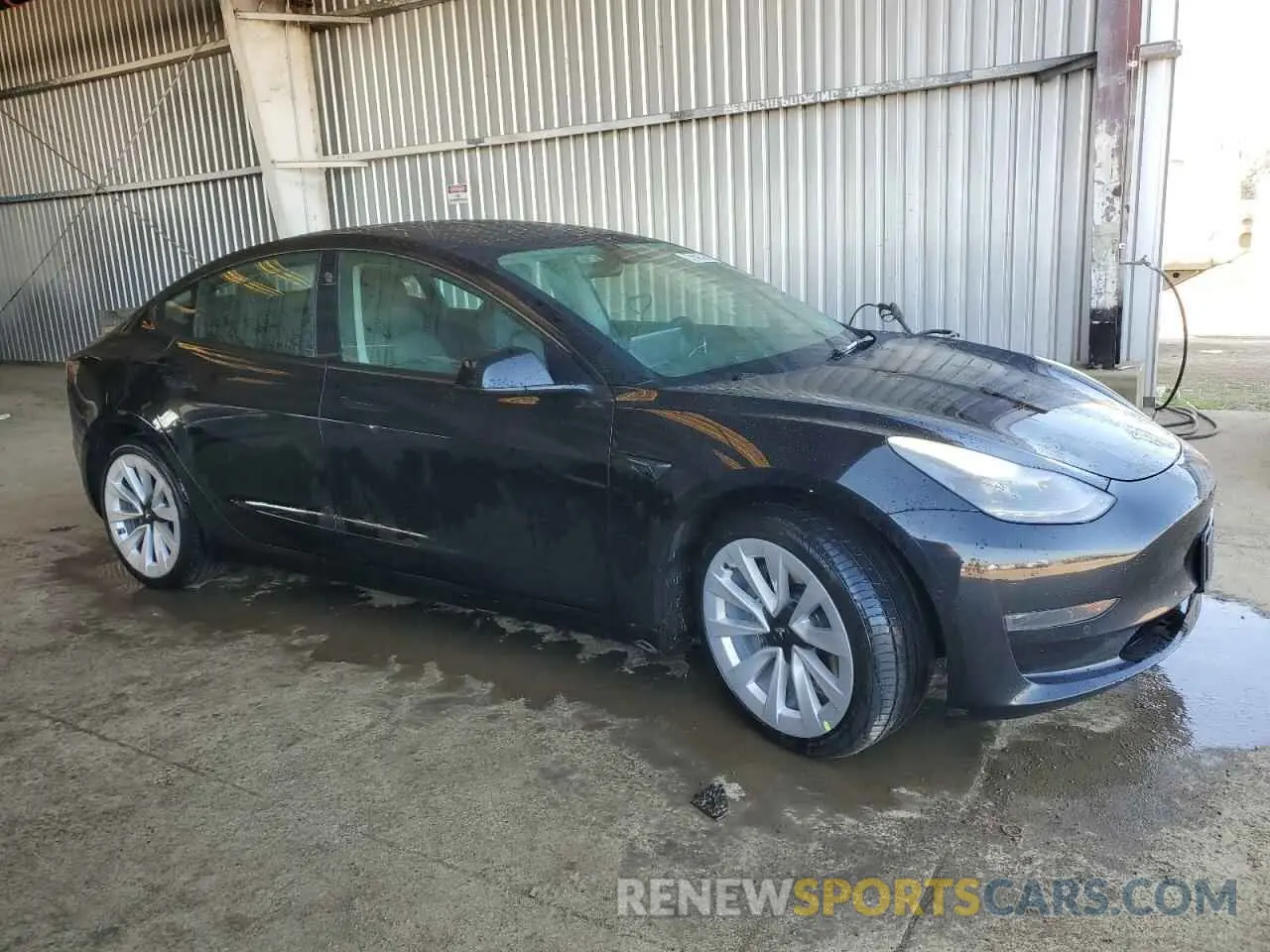 4 Photograph of a damaged car 5YJ3E1EA2NF190124 TESLA MODEL 3 2022