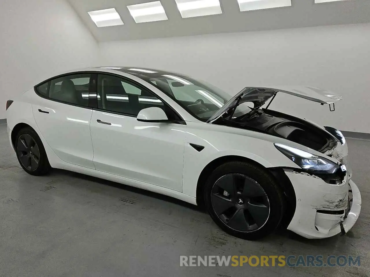 4 Photograph of a damaged car 5YJ3E1EA2NF290109 TESLA MODEL 3 2022