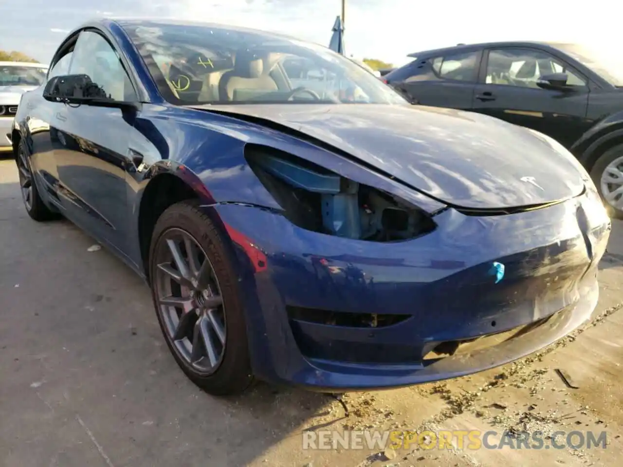 4 Photograph of a damaged car 5YJ3E1EA2NF304400 TESLA MODEL 3 2022