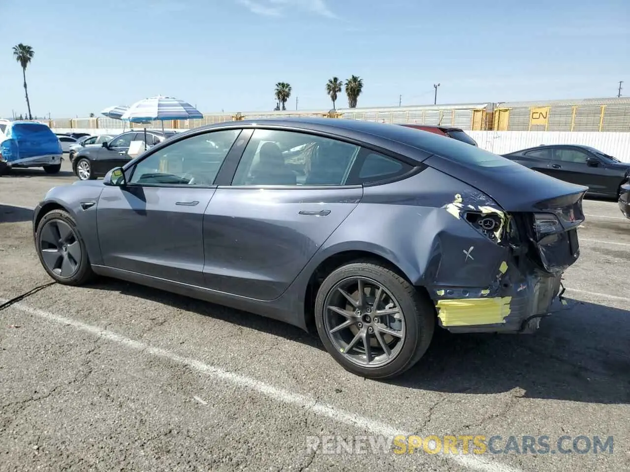2 Photograph of a damaged car 5YJ3E1EA2NF318667 TESLA MODEL 3 2022
