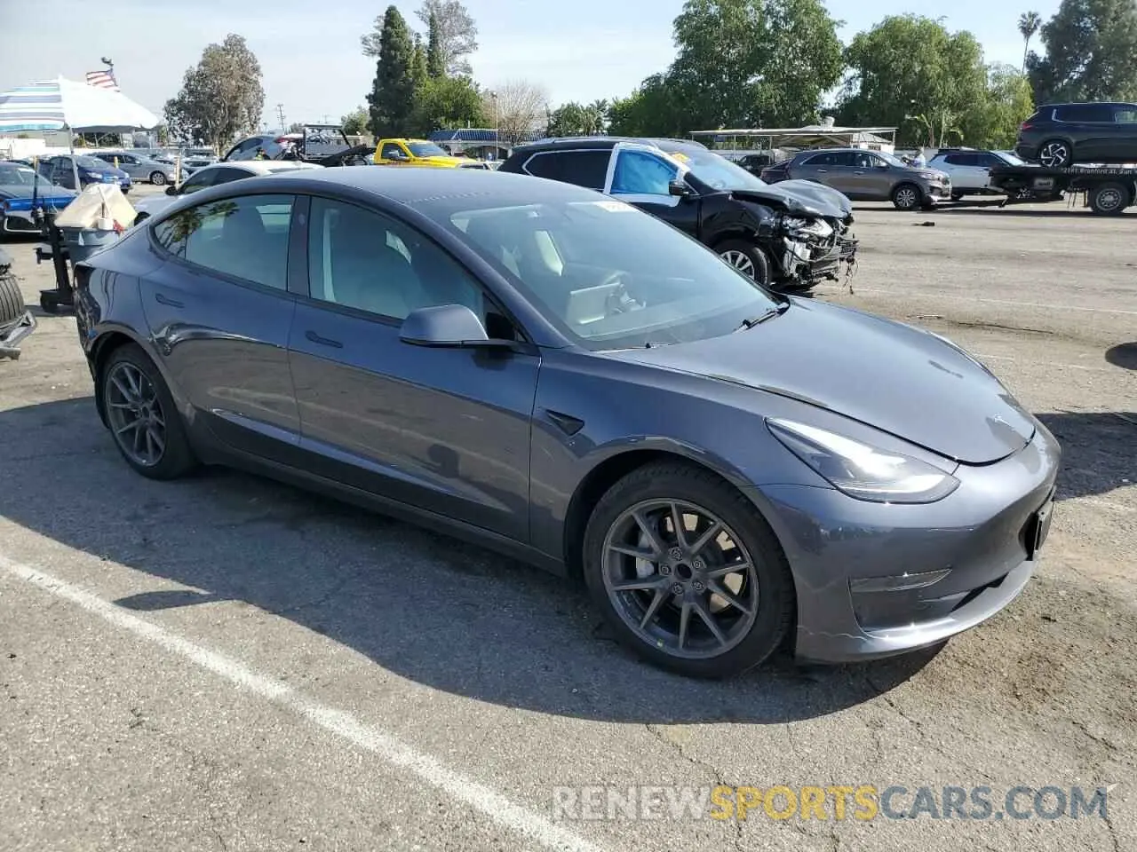 4 Photograph of a damaged car 5YJ3E1EA2NF318667 TESLA MODEL 3 2022