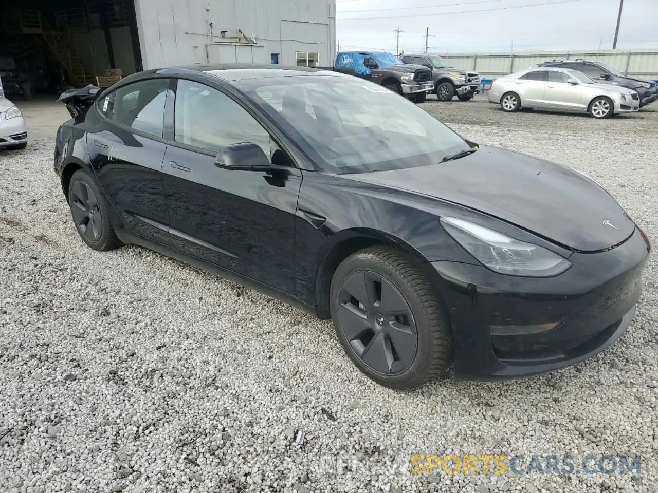 4 Photograph of a damaged car 5YJ3E1EA2NF320418 TESLA MODEL 3 2022