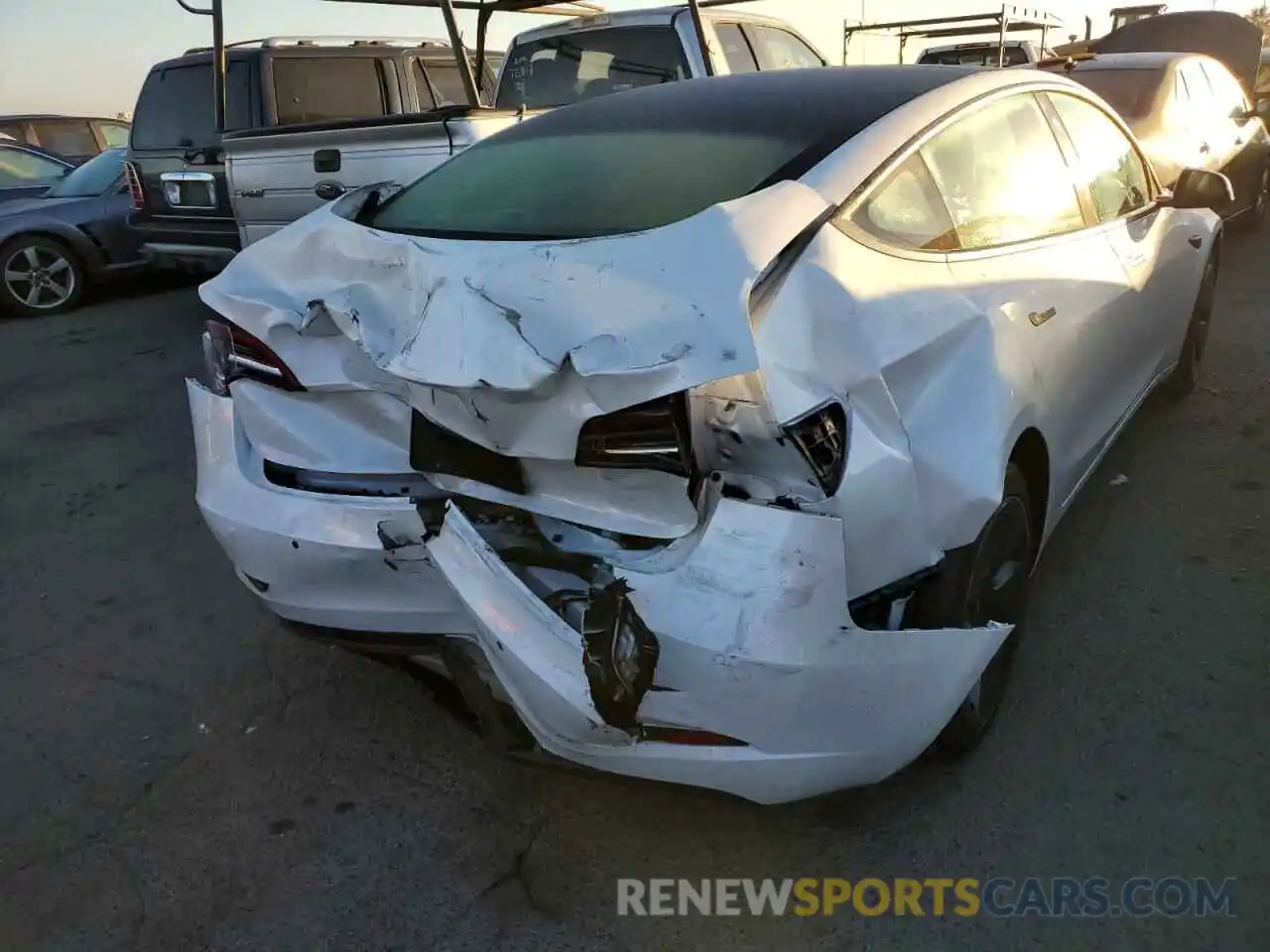 4 Photograph of a damaged car 5YJ3E1EA2NF351071 TESLA MODEL 3 2022