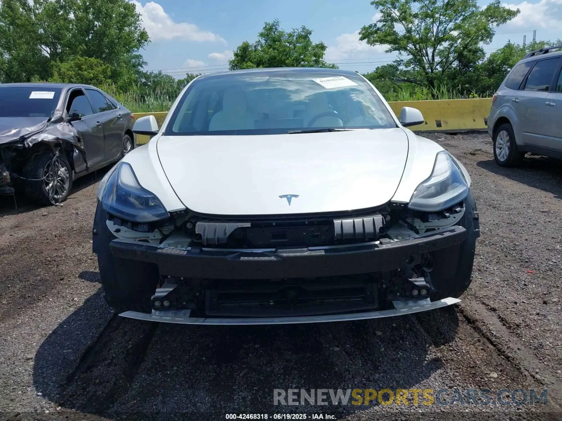 12 Photograph of a damaged car 5YJ3E1EA2NF353869 TESLA MODEL 3 2022