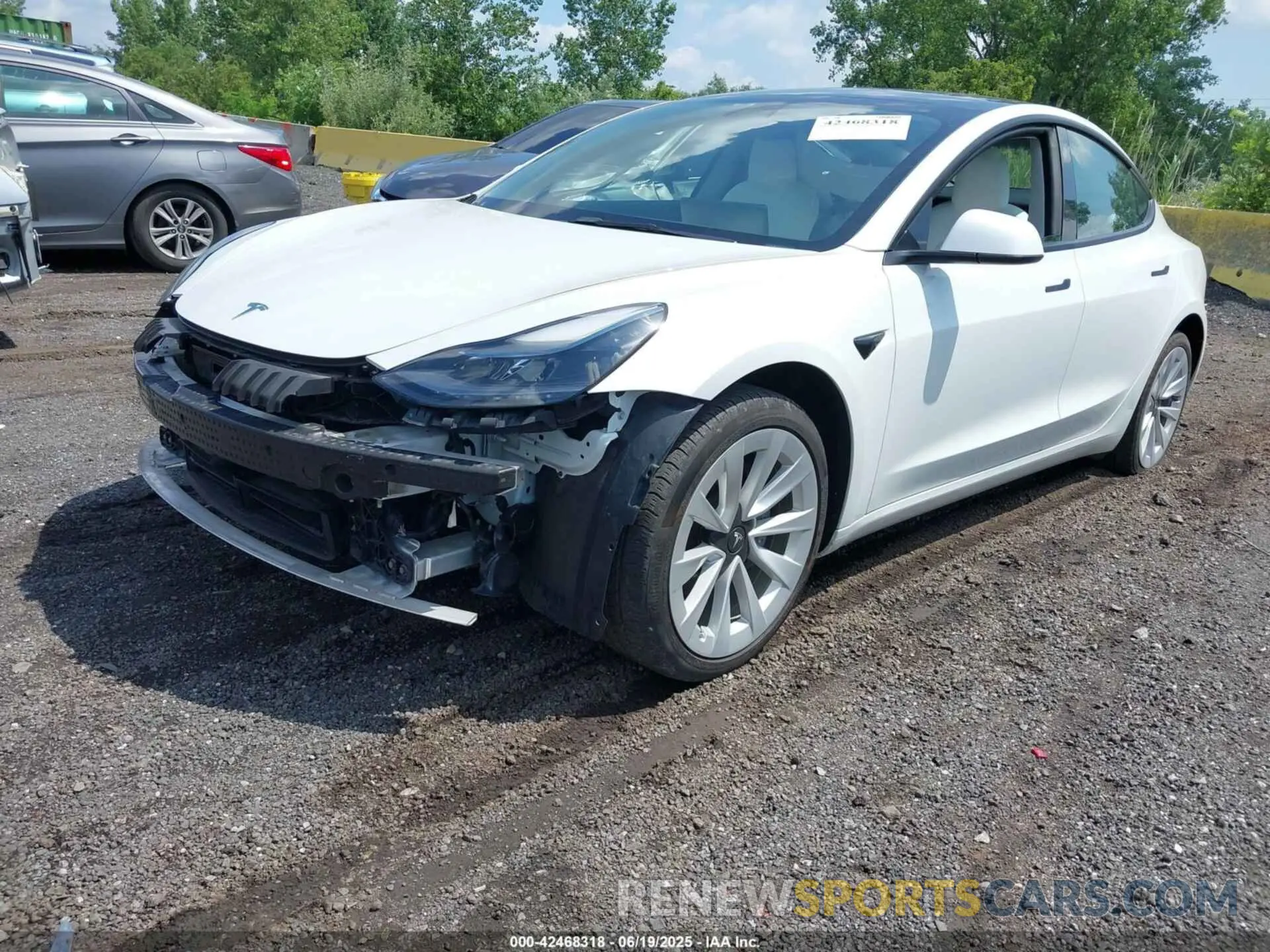 2 Photograph of a damaged car 5YJ3E1EA2NF353869 TESLA MODEL 3 2022