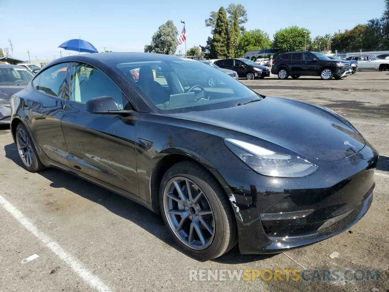 4 Photograph of a damaged car 5YJ3E1EA2NF361146 TESLA MODEL 3 2022