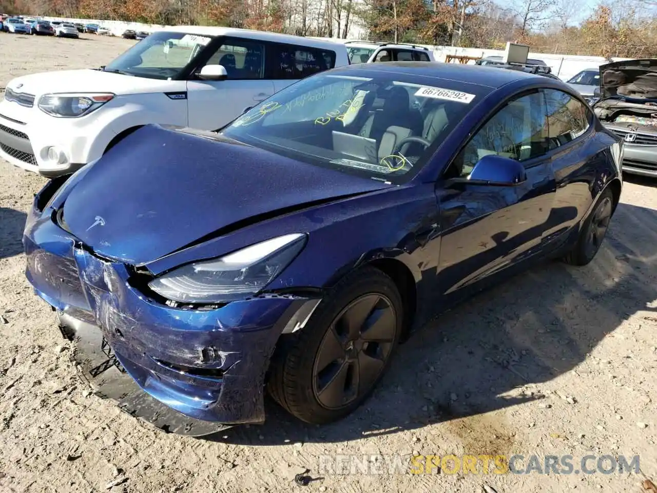 2 Photograph of a damaged car 5YJ3E1EA2NF370722 TESLA MODEL 3 2022