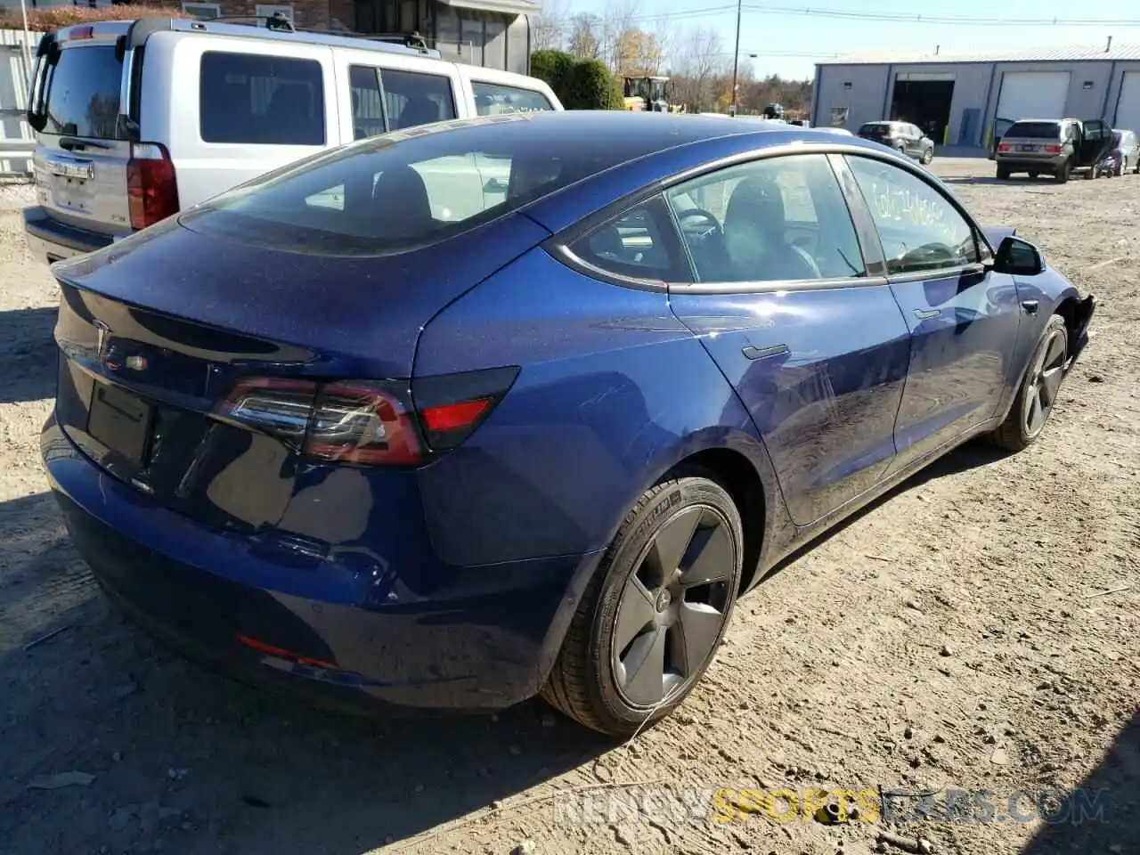 4 Photograph of a damaged car 5YJ3E1EA2NF370722 TESLA MODEL 3 2022