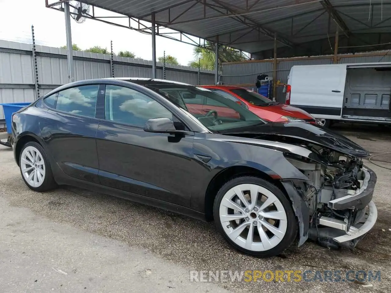 4 Photograph of a damaged car 5YJ3E1EA2NF371742 TESLA MODEL 3 2022