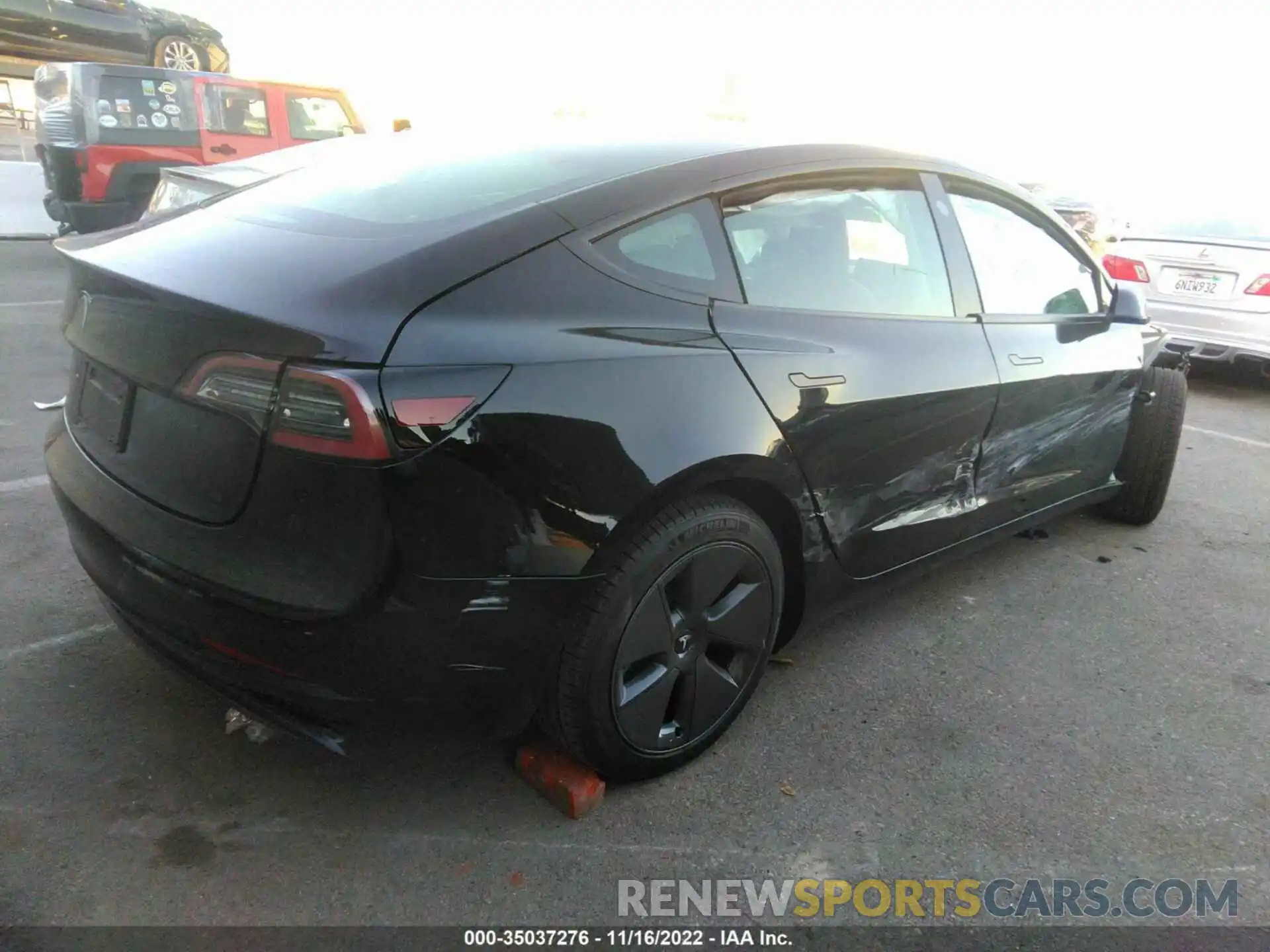 4 Photograph of a damaged car 5YJ3E1EA2NF374740 TESLA MODEL 3 2022