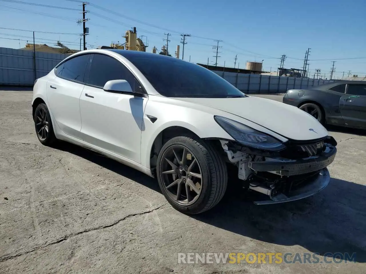 4 Photograph of a damaged car 5YJ3E1EA3NF125895 TESLA MODEL 3 2022