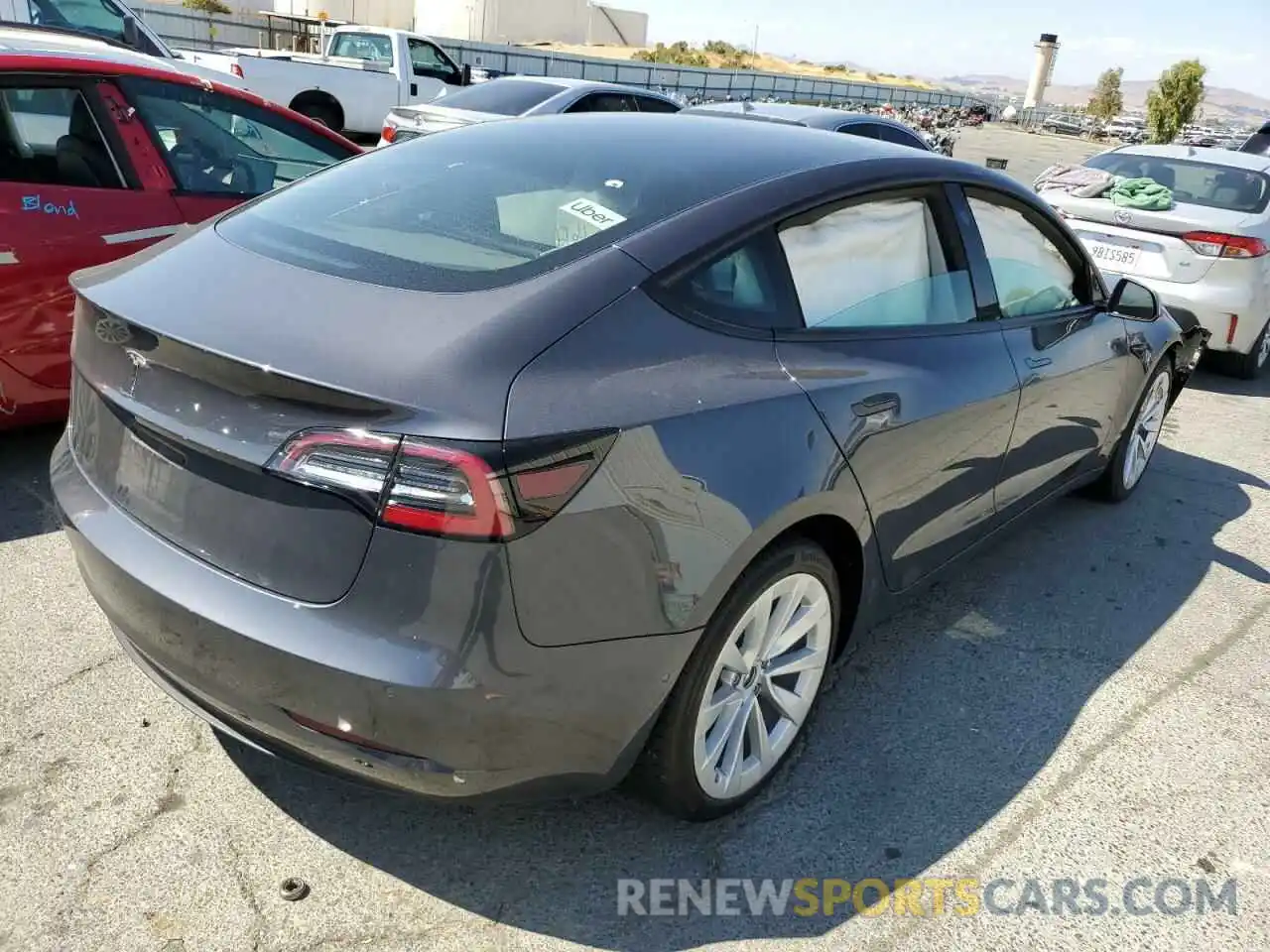 4 Photograph of a damaged car 5YJ3E1EA3NF144348 TESLA MODEL 3 2022