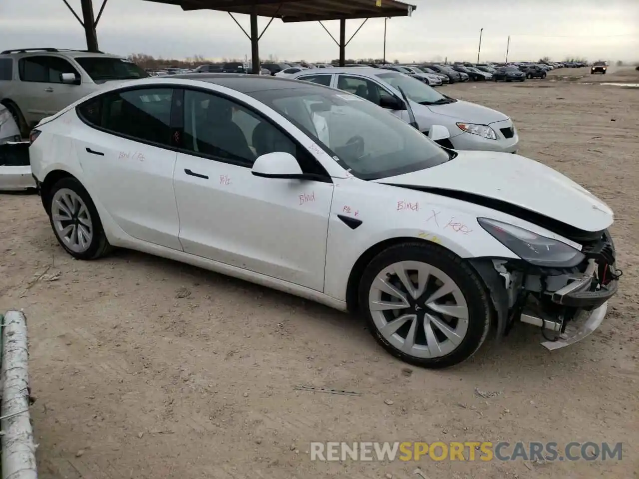 4 Photograph of a damaged car 5YJ3E1EA3NF184736 TESLA MODEL 3 2022