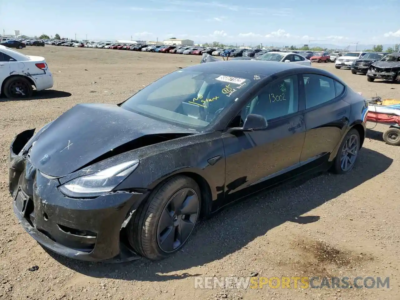 2 Photograph of a damaged car 5YJ3E1EA3NF185787 TESLA MODEL 3 2022