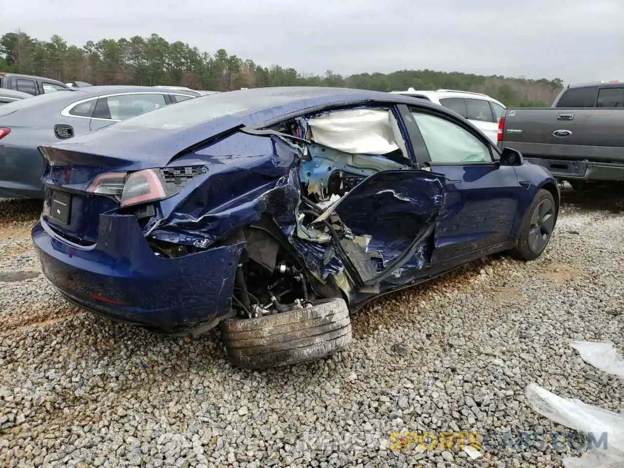 3 Photograph of a damaged car 5YJ3E1EA3NF188737 TESLA MODEL 3 2022