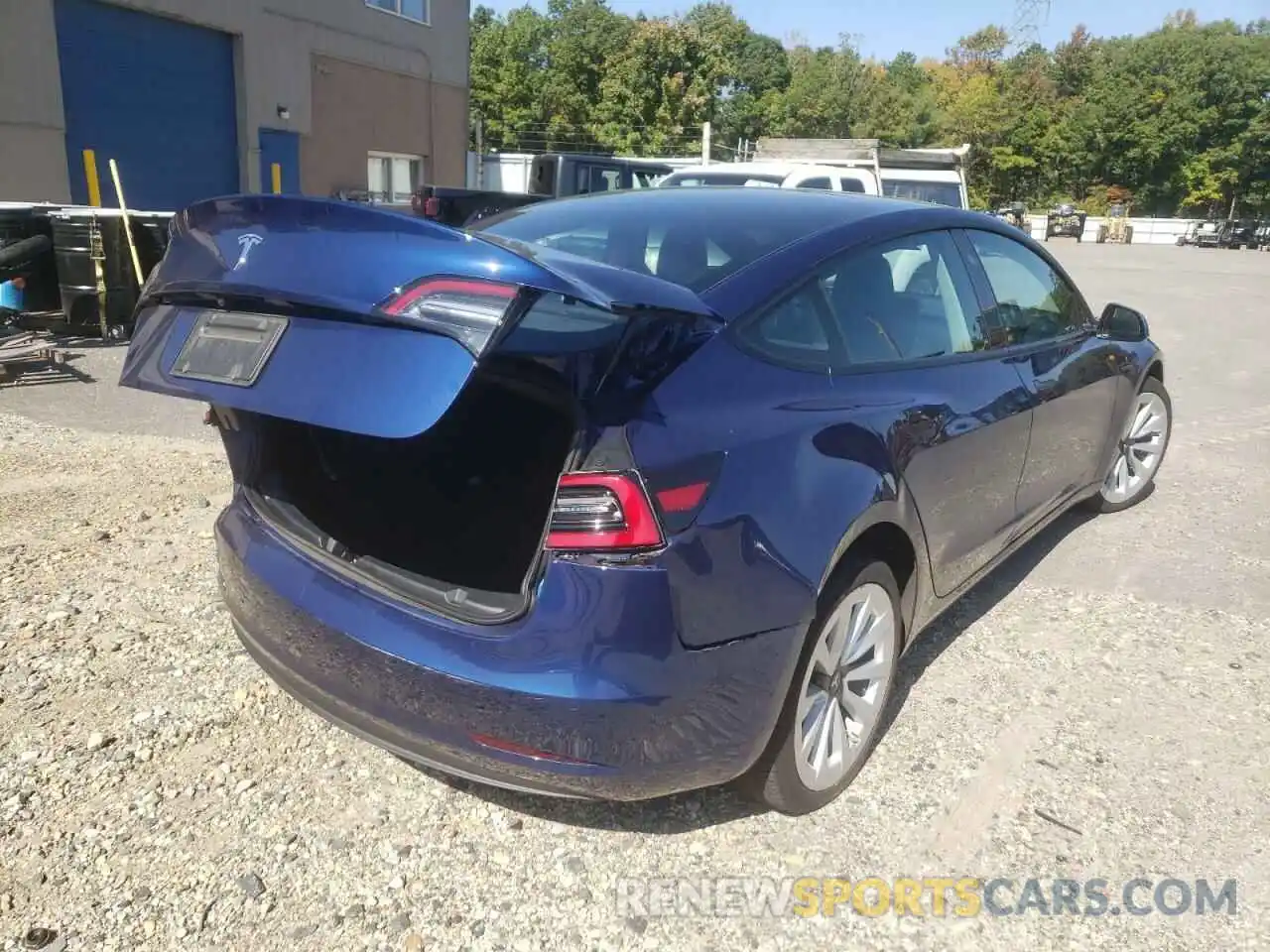 4 Photograph of a damaged car 5YJ3E1EA3NF189032 TESLA MODEL 3 2022