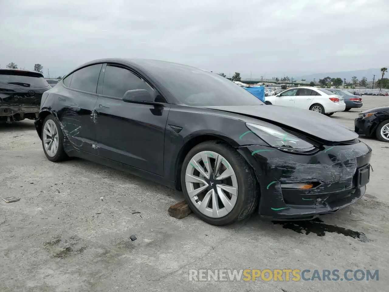 4 Photograph of a damaged car 5YJ3E1EA3NF190102 TESLA MODEL 3 2022