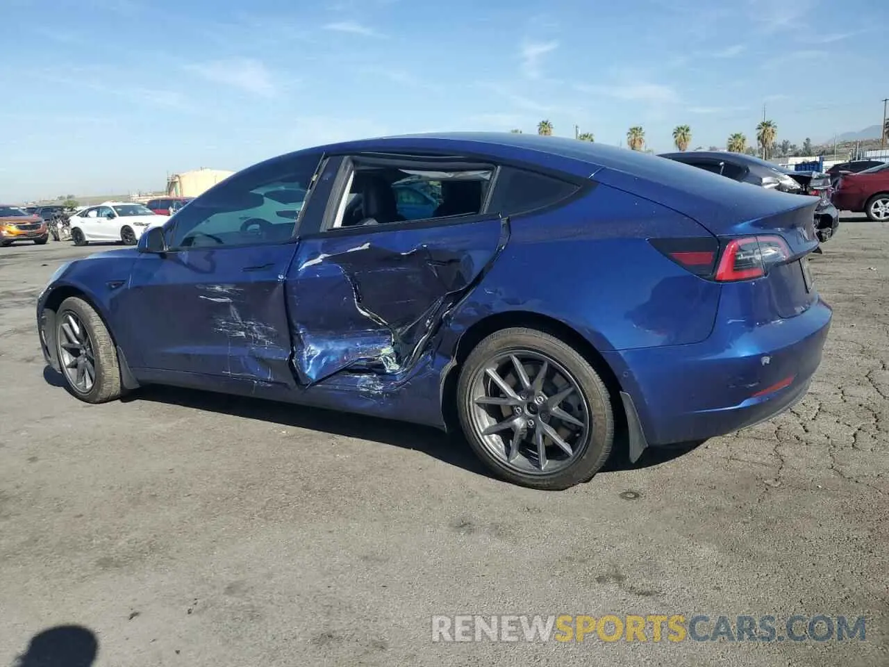 2 Photograph of a damaged car 5YJ3E1EA3NF285775 TESLA MODEL 3 2022