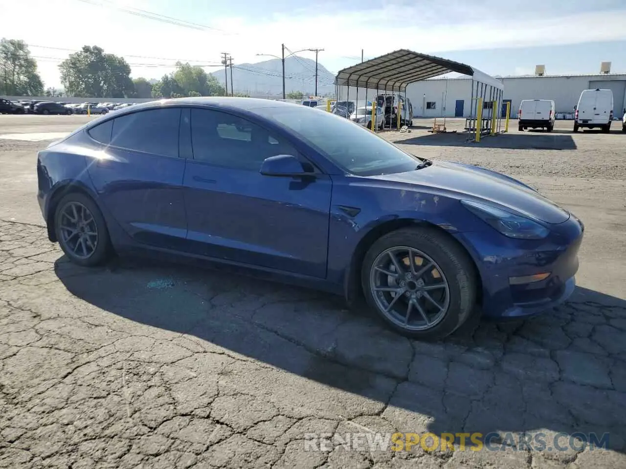 4 Photograph of a damaged car 5YJ3E1EA3NF285775 TESLA MODEL 3 2022