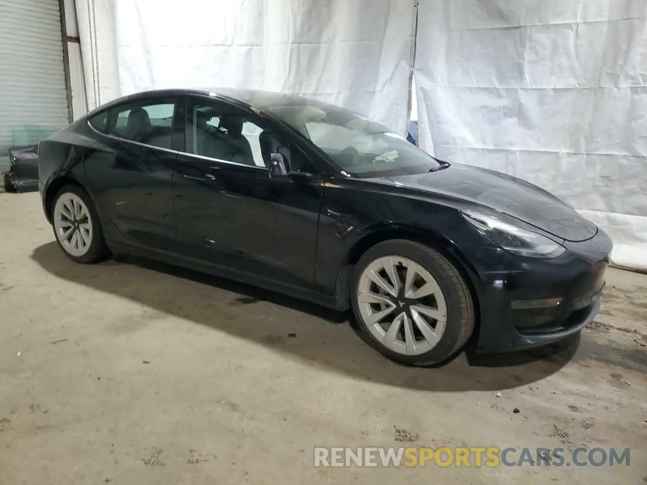 4 Photograph of a damaged car 5YJ3E1EA3NF291205 TESLA MODEL 3 2022