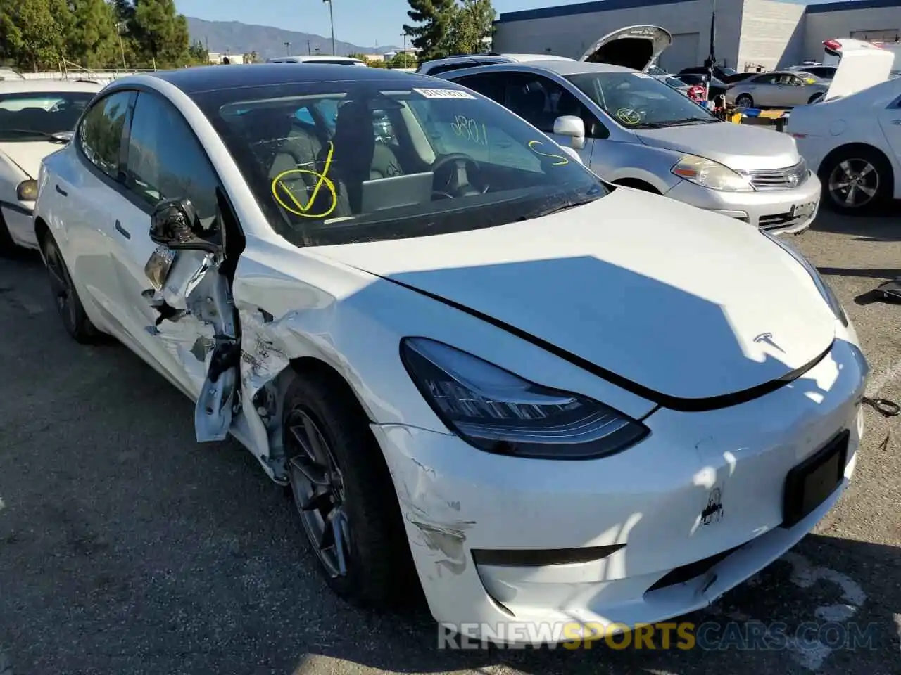 4 Photograph of a damaged car 5YJ3E1EA3NF296002 TESLA MODEL 3 2022