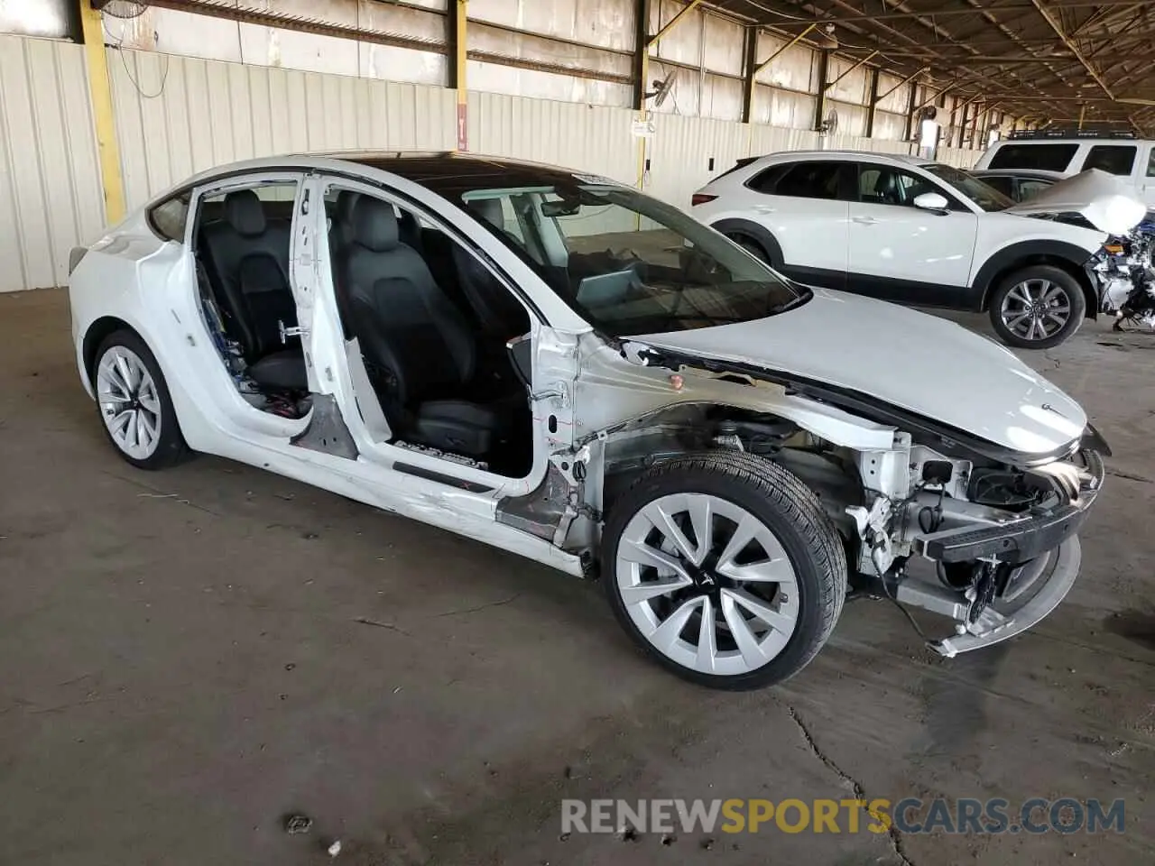 4 Photograph of a damaged car 5YJ3E1EA3NF304468 TESLA MODEL 3 2022