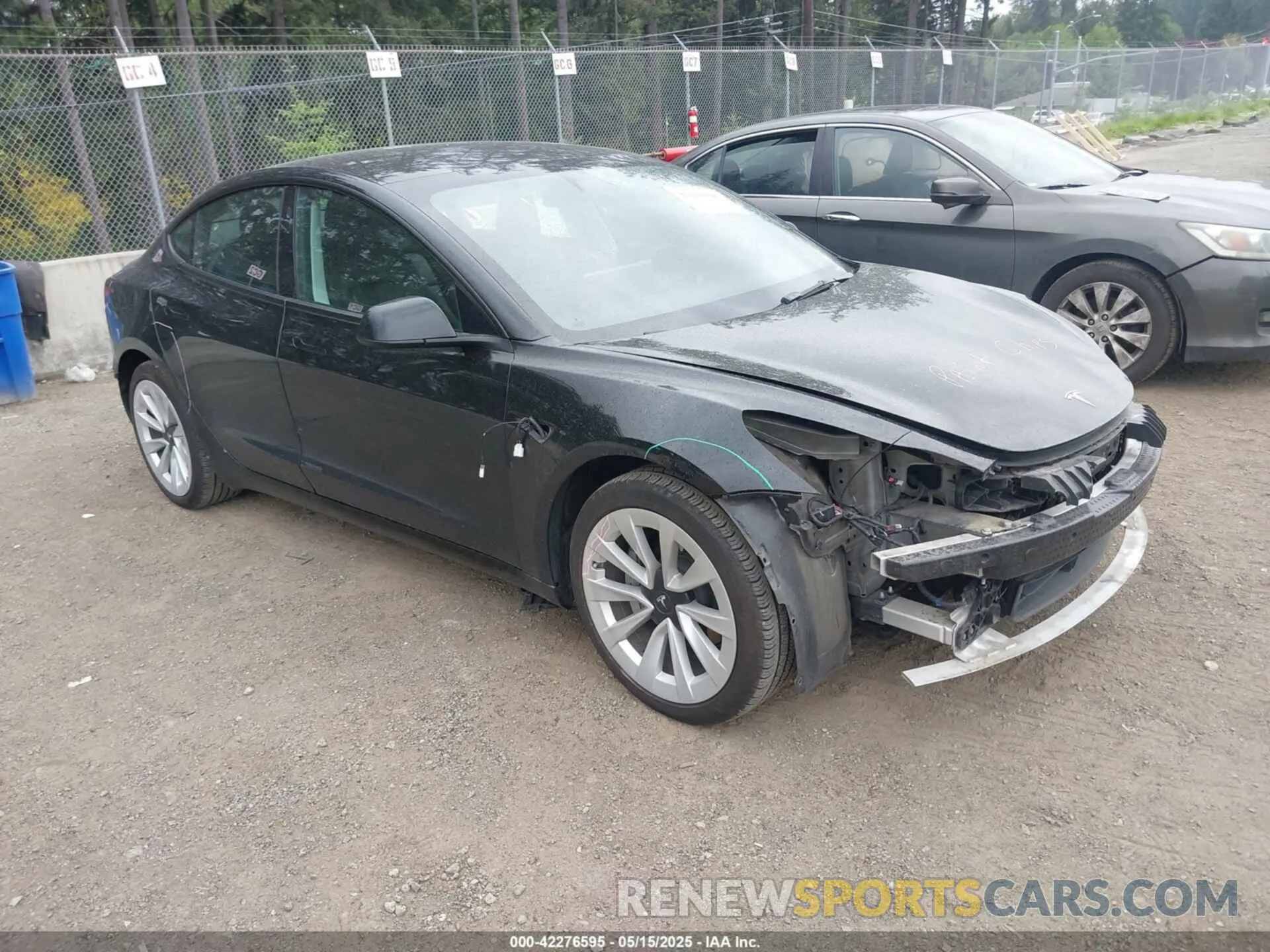 1 Photograph of a damaged car 5YJ3E1EA3NF355923 TESLA MODEL 3 2022