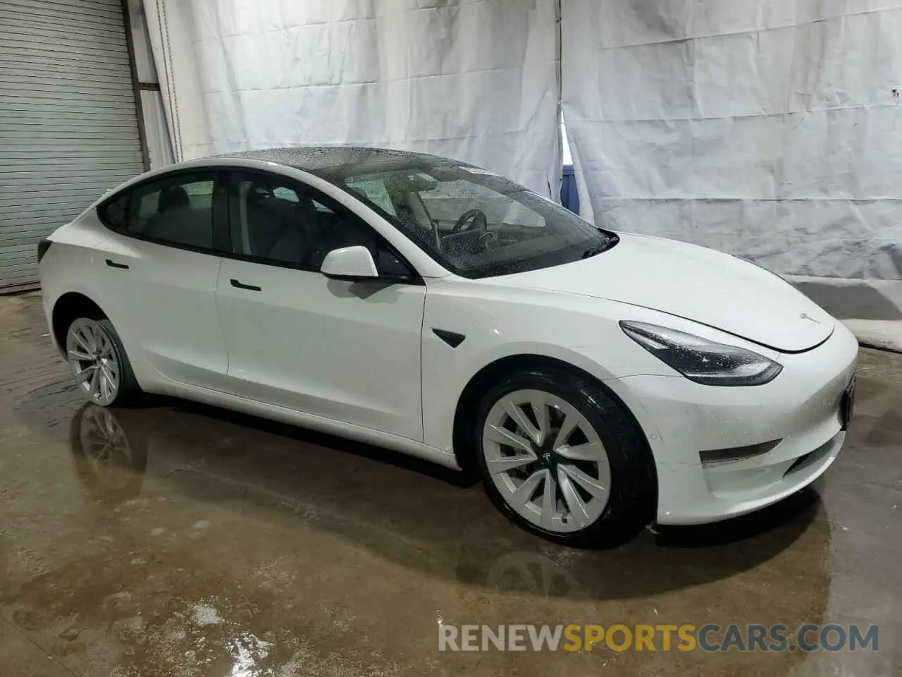4 Photograph of a damaged car 5YJ3E1EA3NF371376 TESLA MODEL 3 2022