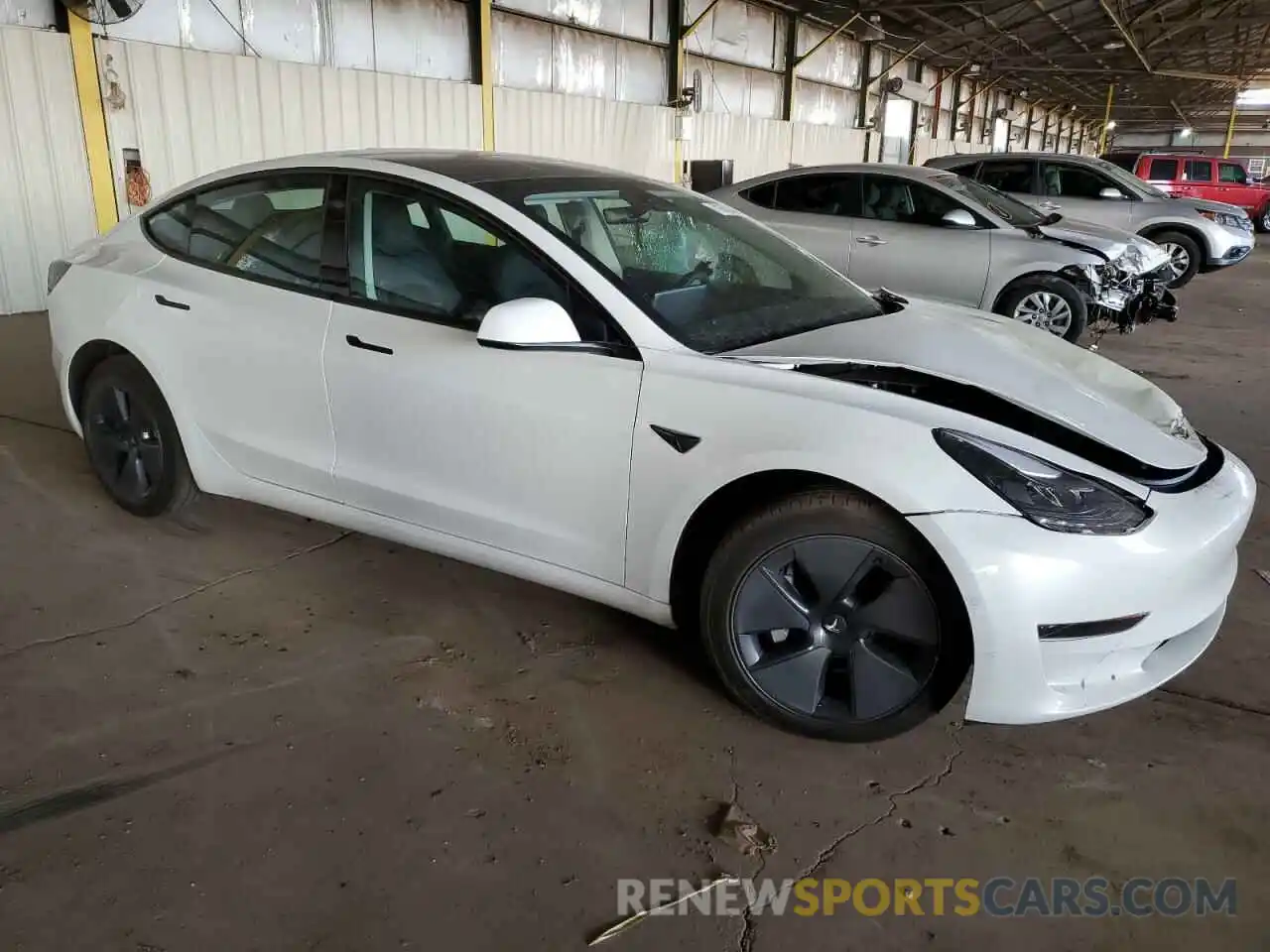 4 Photograph of a damaged car 5YJ3E1EA4NF115814 TESLA MODEL 3 2022