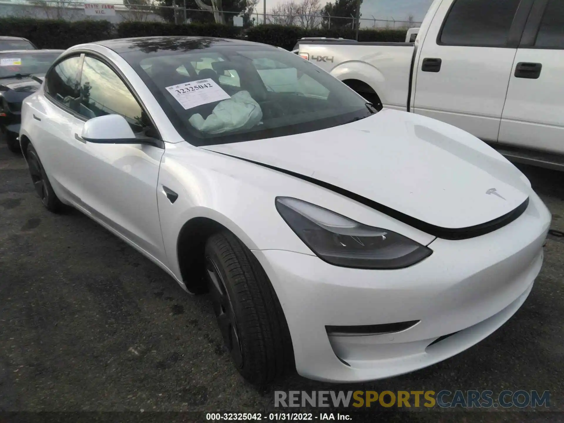 1 Photograph of a damaged car 5YJ3E1EA4NF133777 TESLA MODEL 3 2022