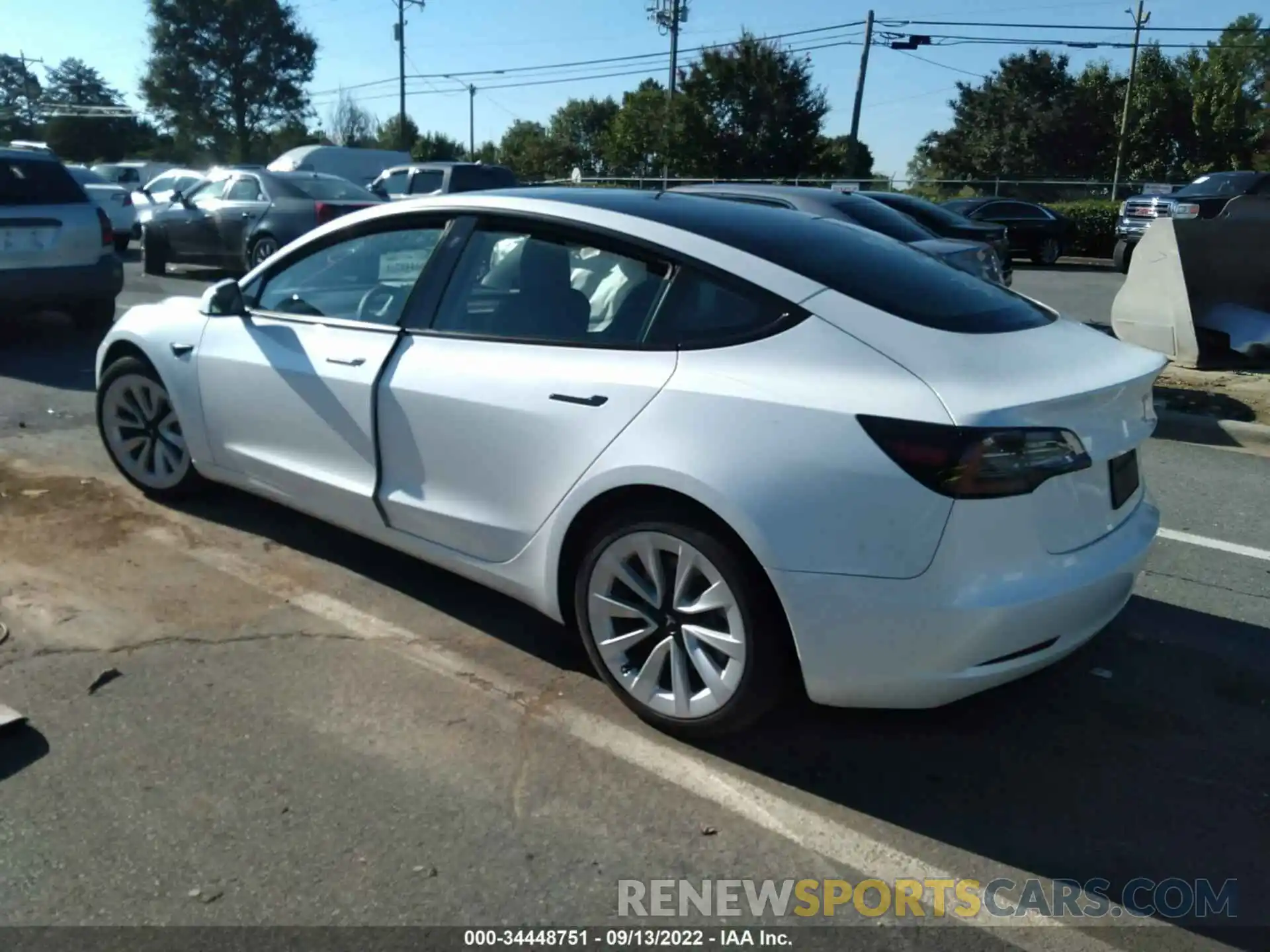 3 Photograph of a damaged car 5YJ3E1EA4NF239906 TESLA MODEL 3 2022